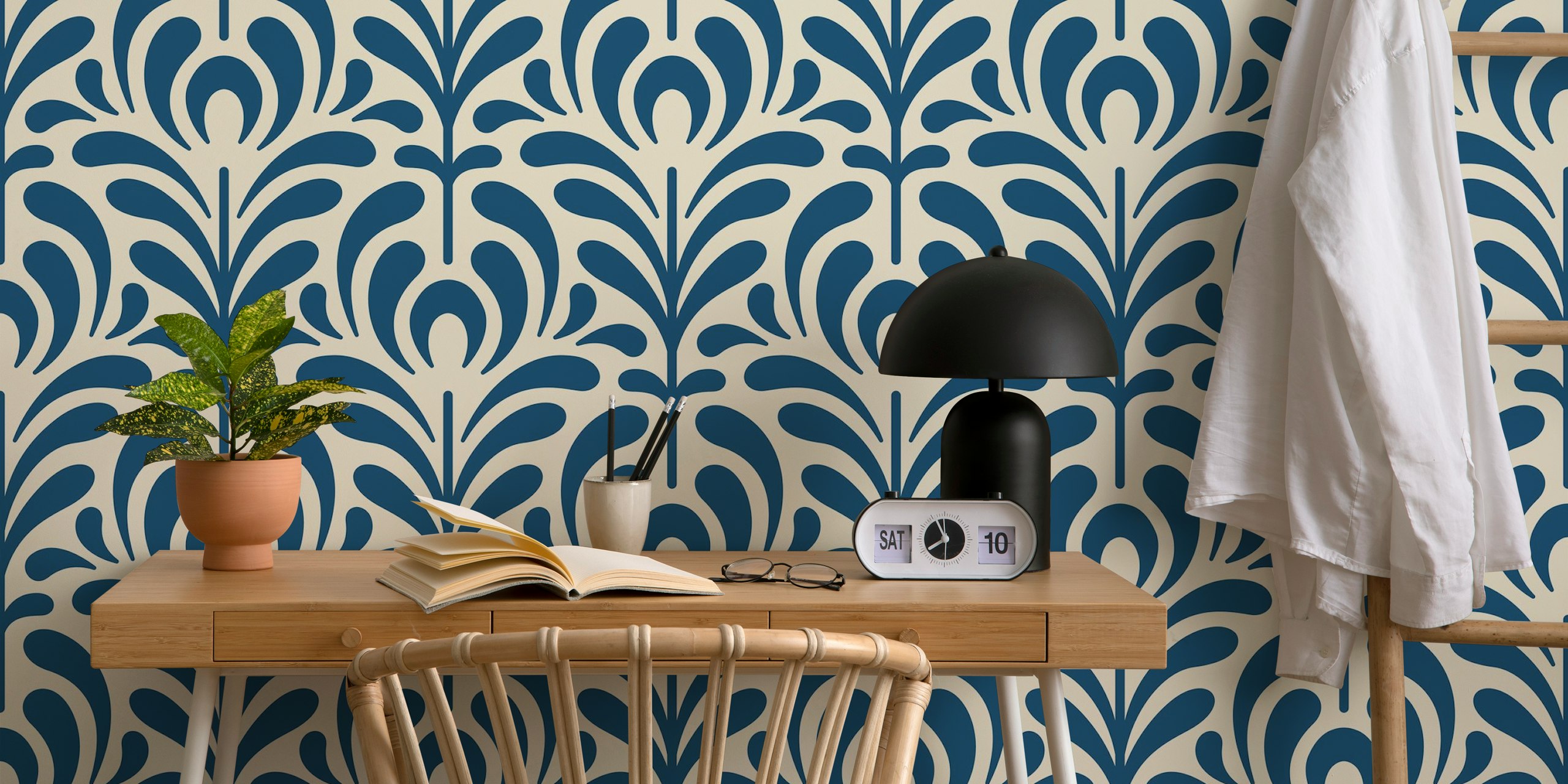 Abstract plant design in navy blue on cream background wallpaper