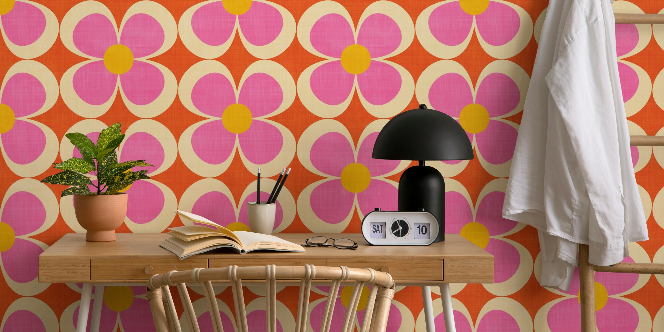 Pink and orange geometric floral wallpaper with large petals and circles