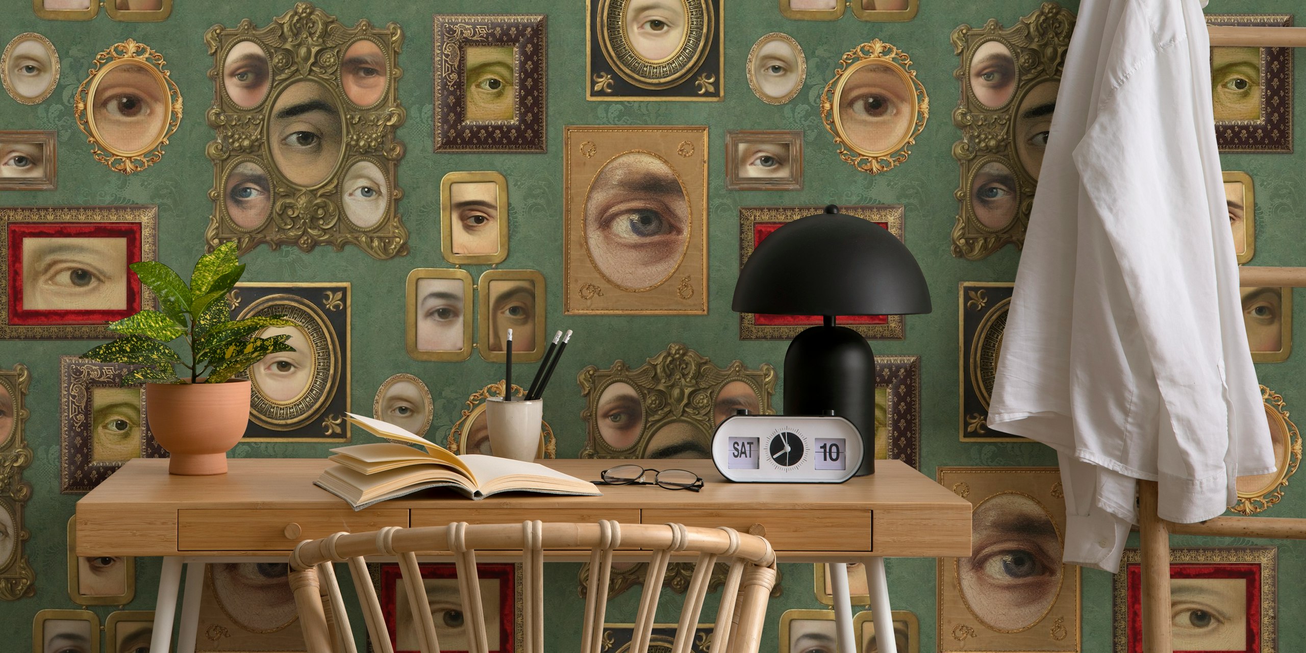 Multiple eye portraits in ornate frames on sage green wallpaper