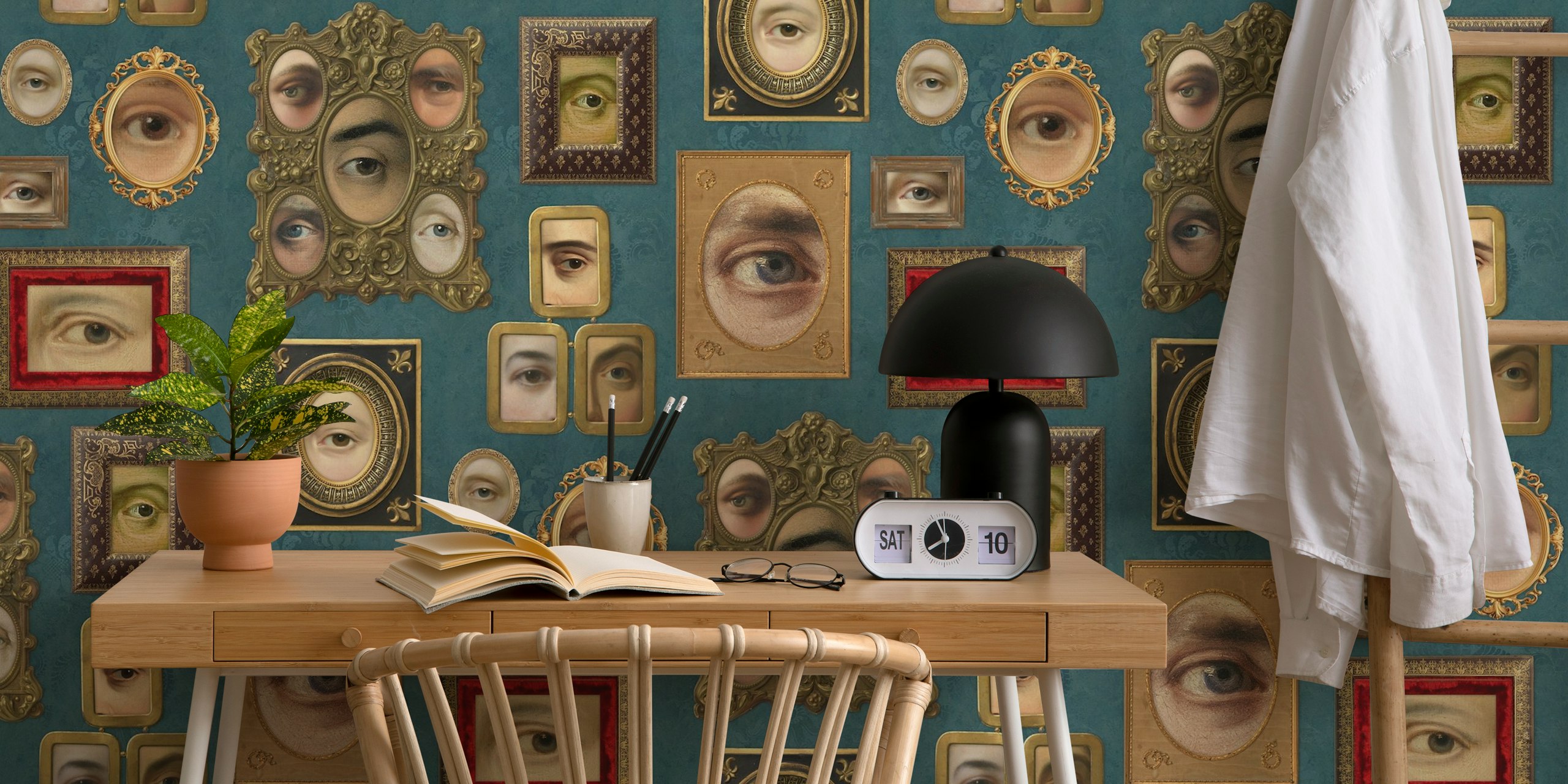 Teal blue wallpaper with Victorian portrait eyes