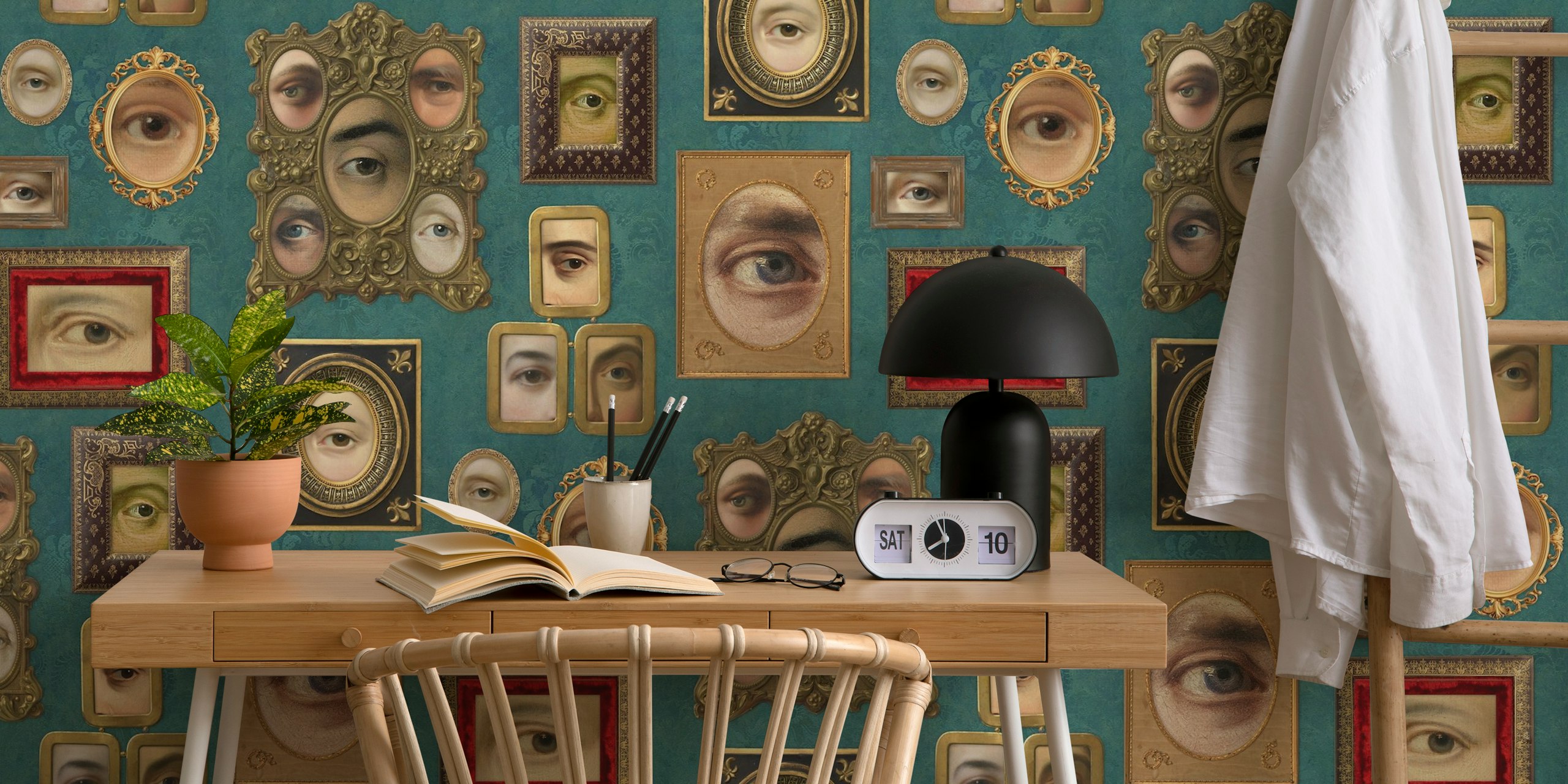 Victorian eye portraits in ornate frames against viridian background wallpaper