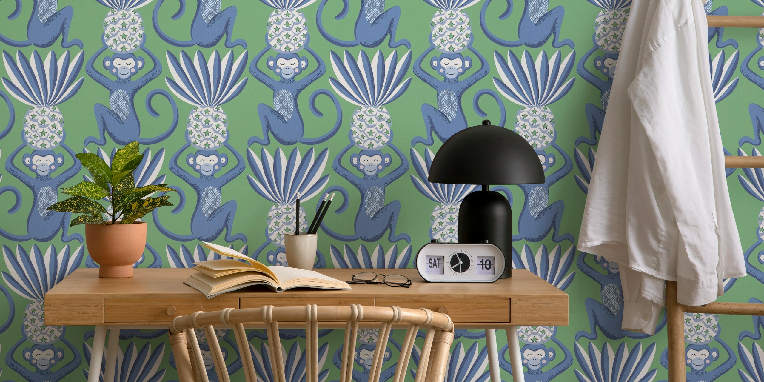 Uzorak zidne slike s plavim majmunima i zelenim ananasom na plavoj pozadini