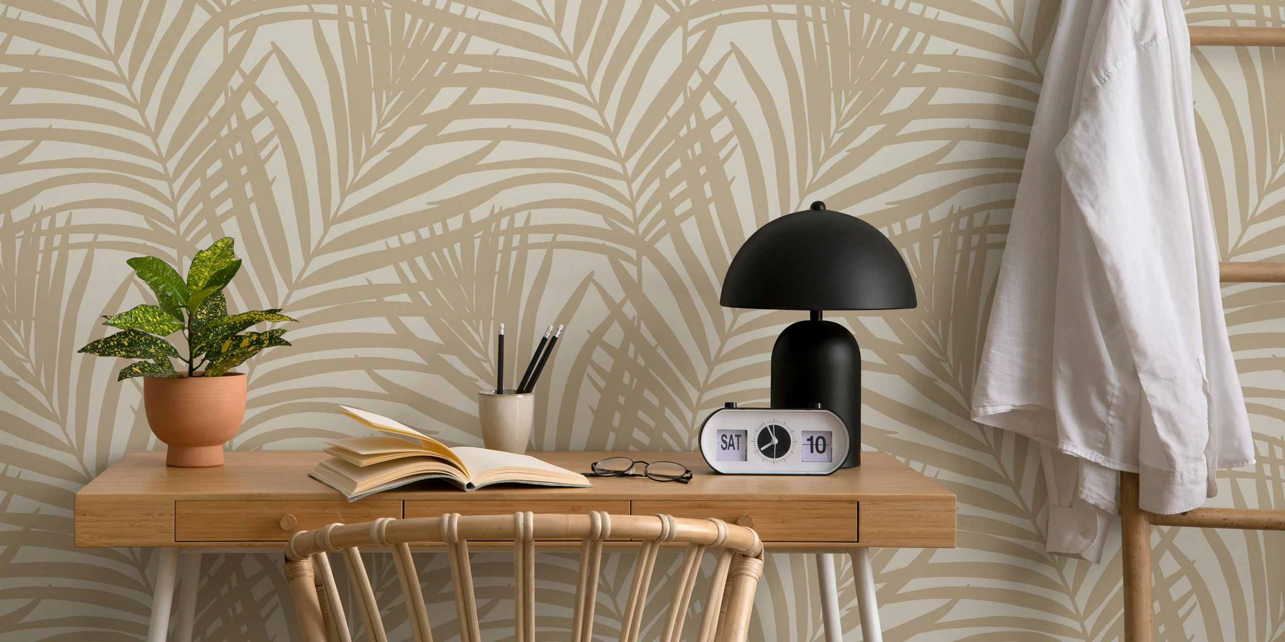 Coastal palm leaves wallpaper design in a room