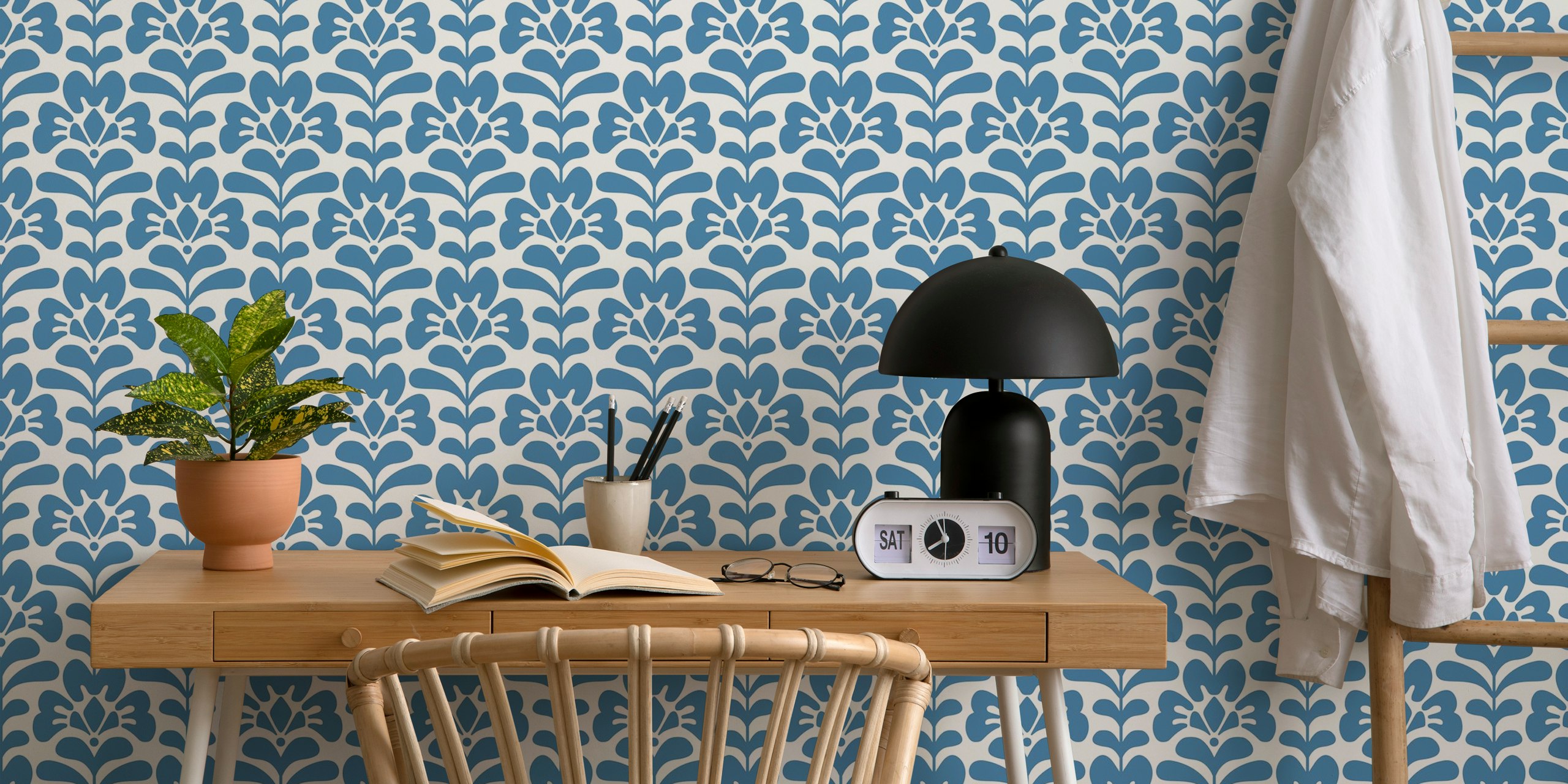 Blue floral pattern on white background wallpaper