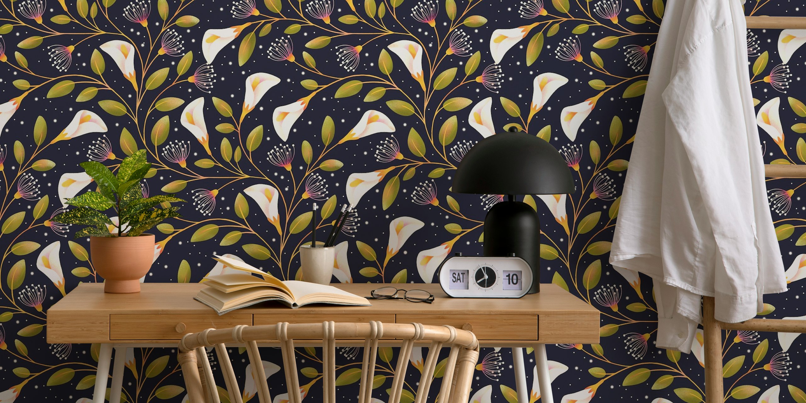 Floral design with white calla lilies and green leaves on a dark background wallpaper