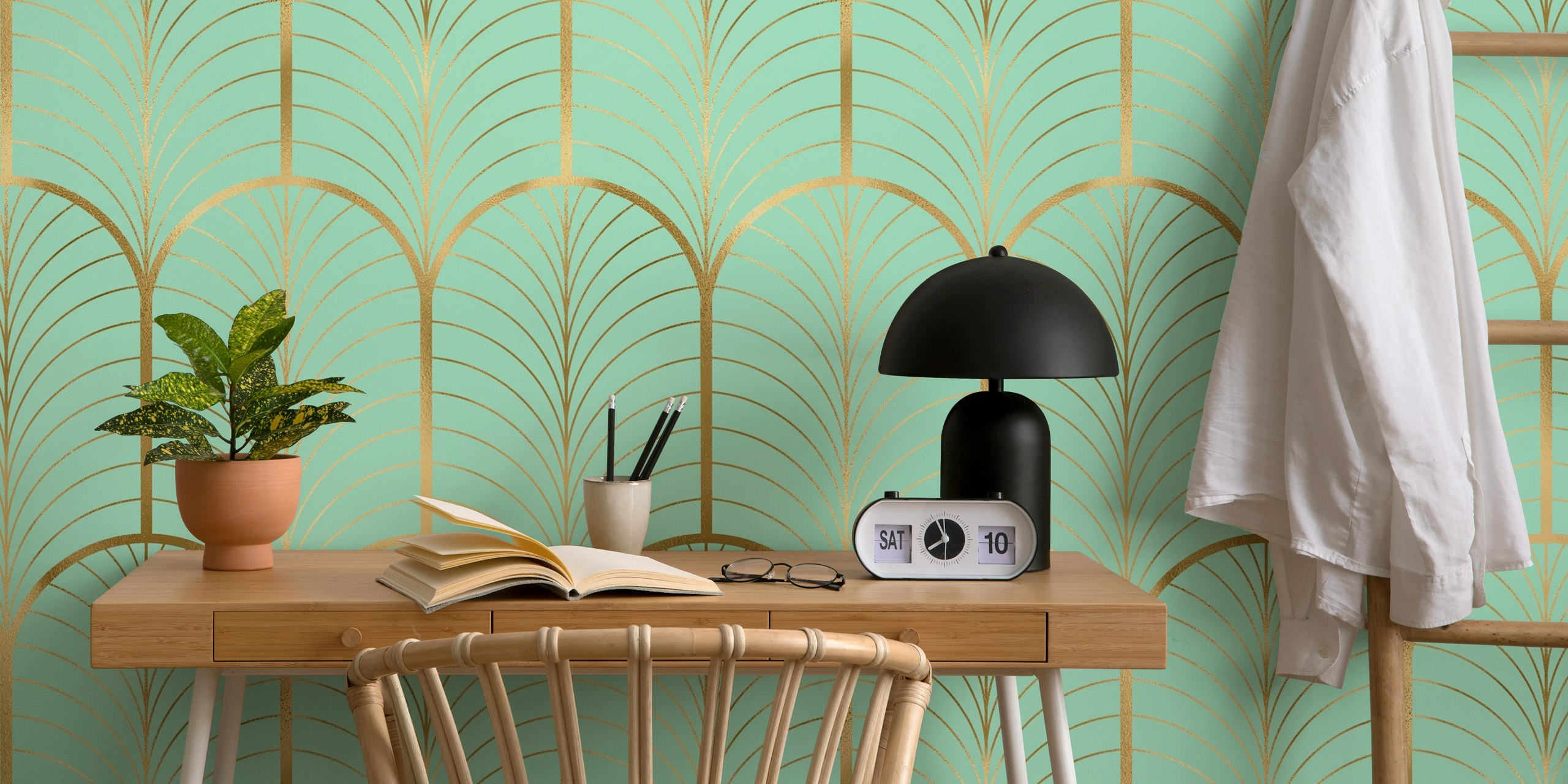 Art Deco wallpaper design in gold and mint green