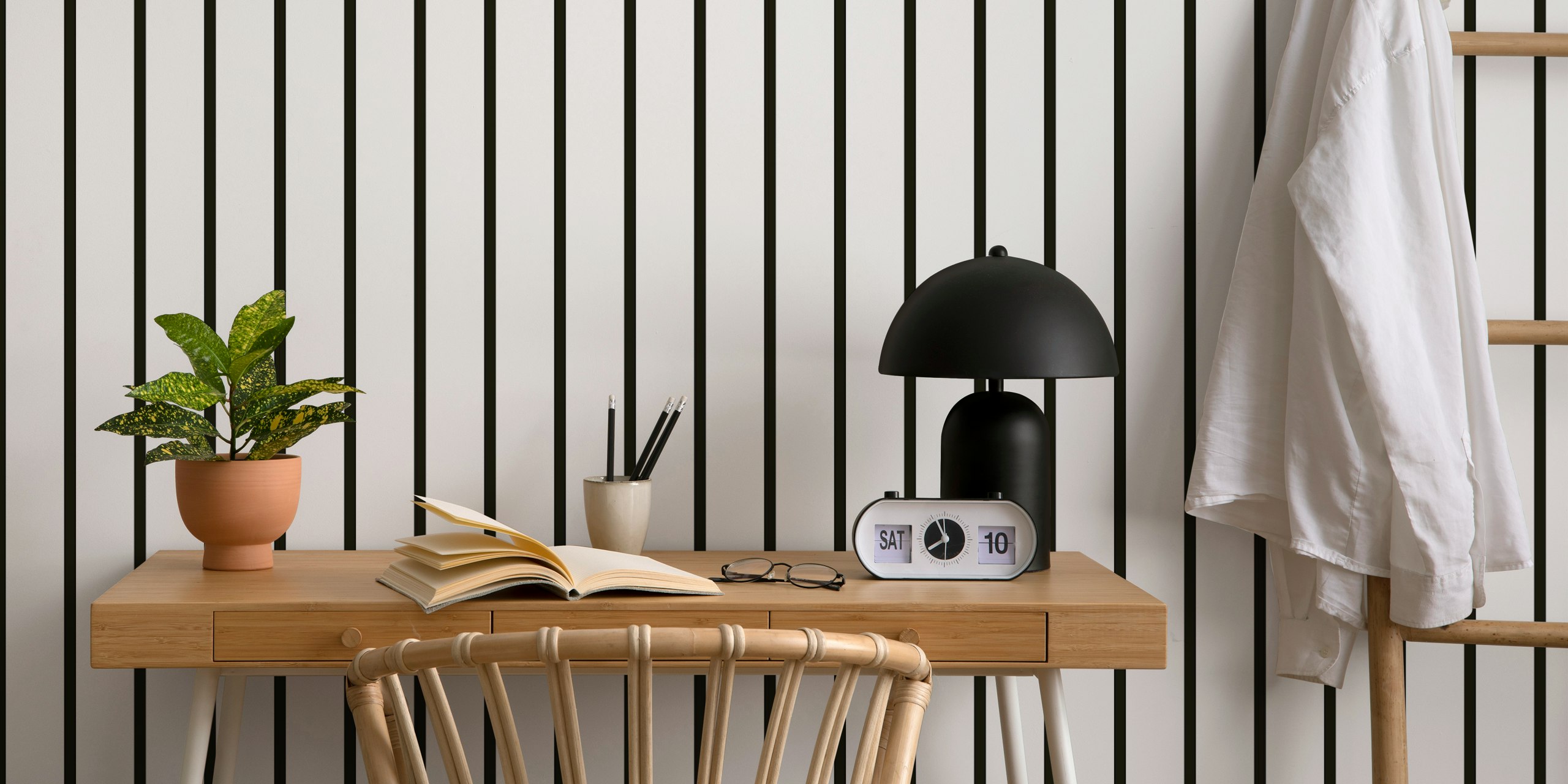 Black and white vertical stripes wallpaper in a room