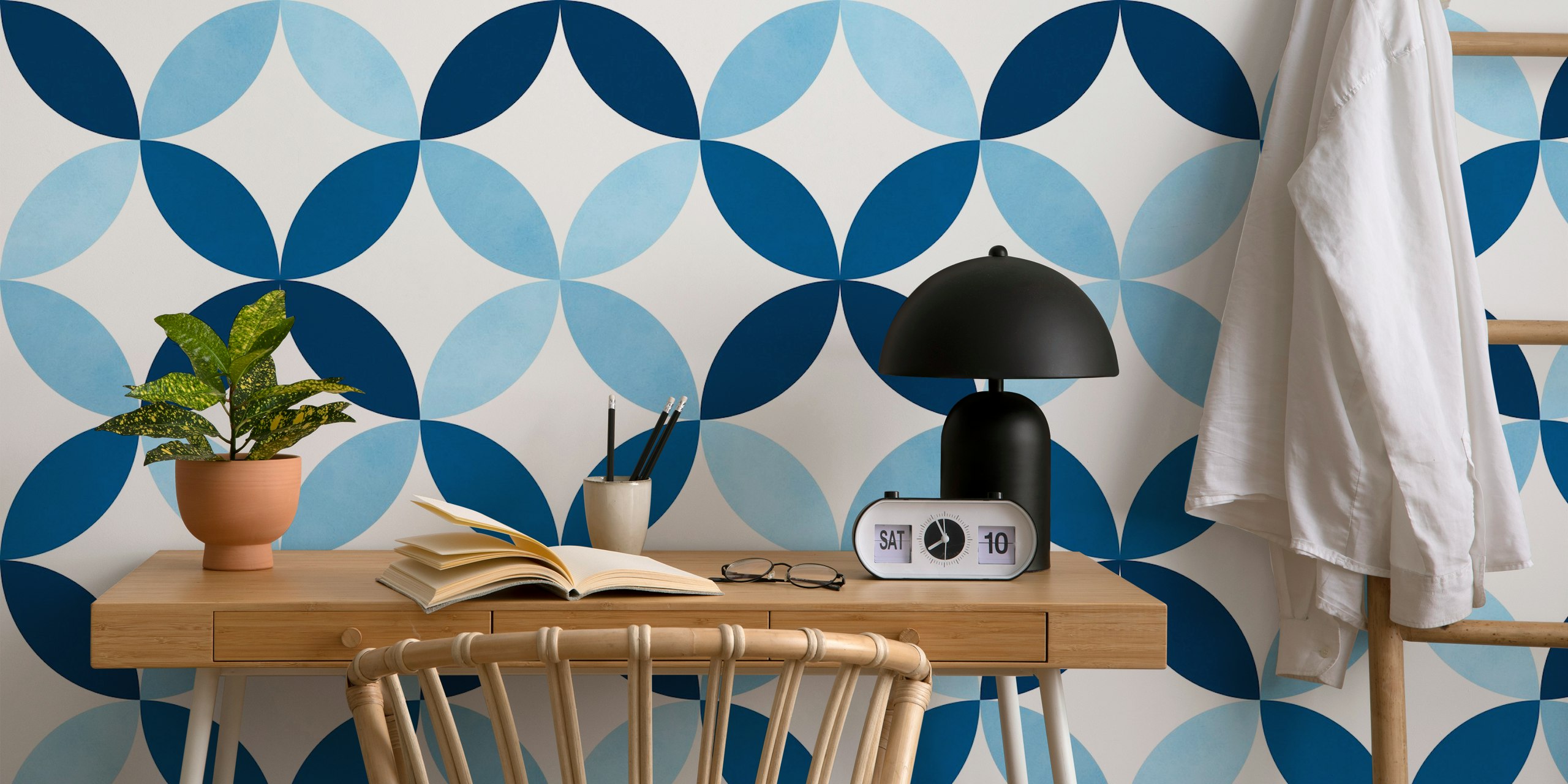 Blue geometric pattern wallpaper in a room
