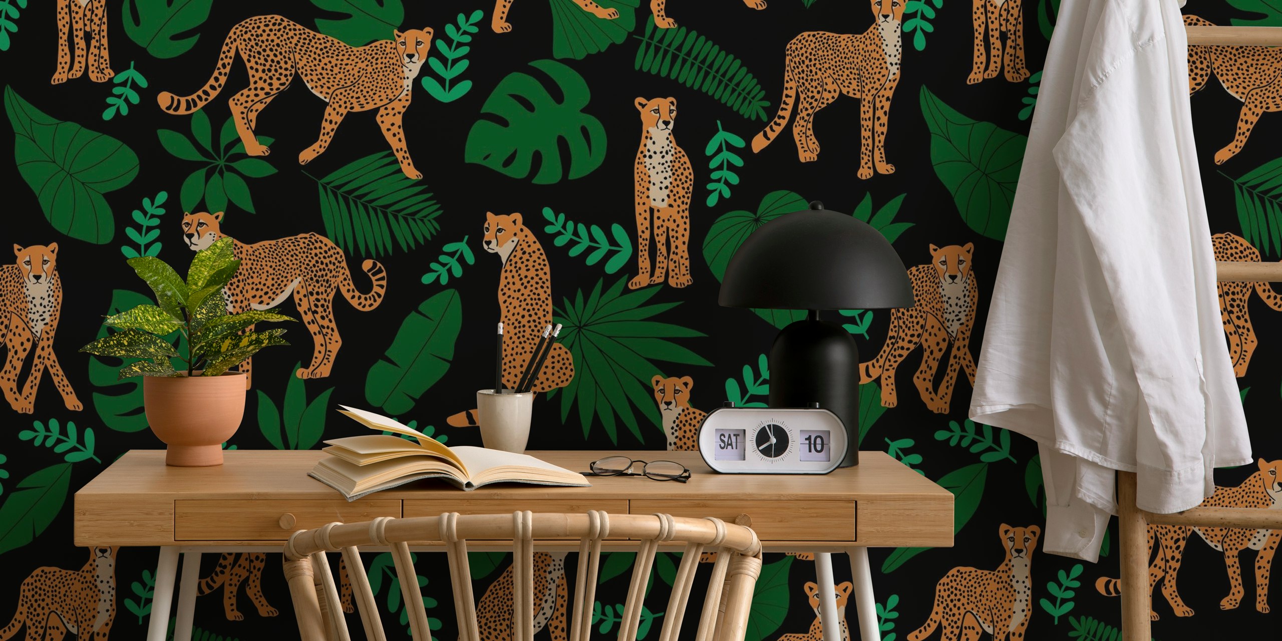 Cheetah and tropical leaves wallpaper in a room