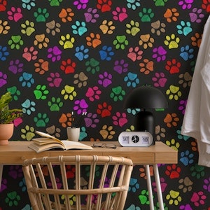 Colorful paw prints with black background