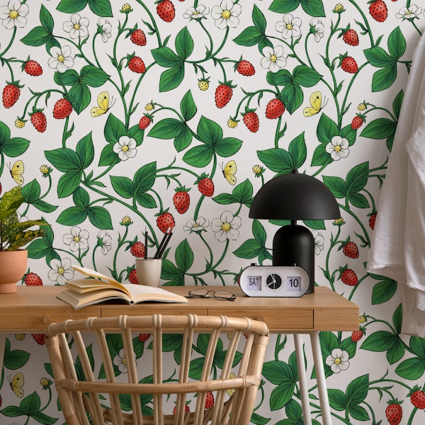 Wild strawberries in red and green