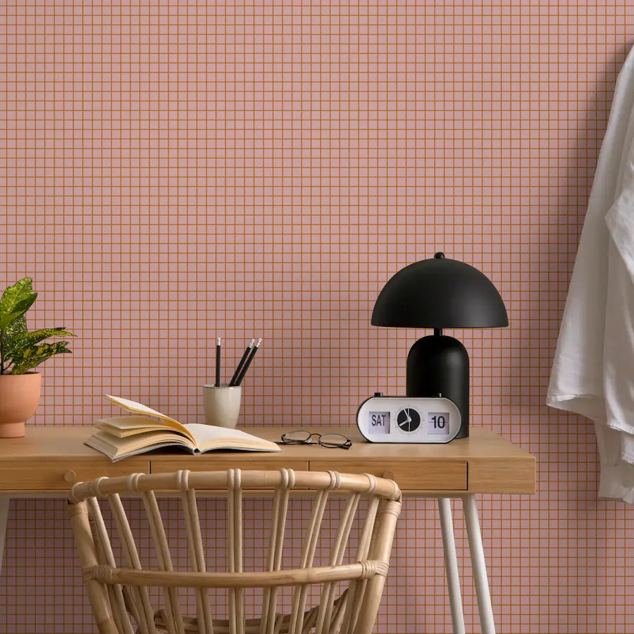 Dusty pink mini grid wallpaper in a room