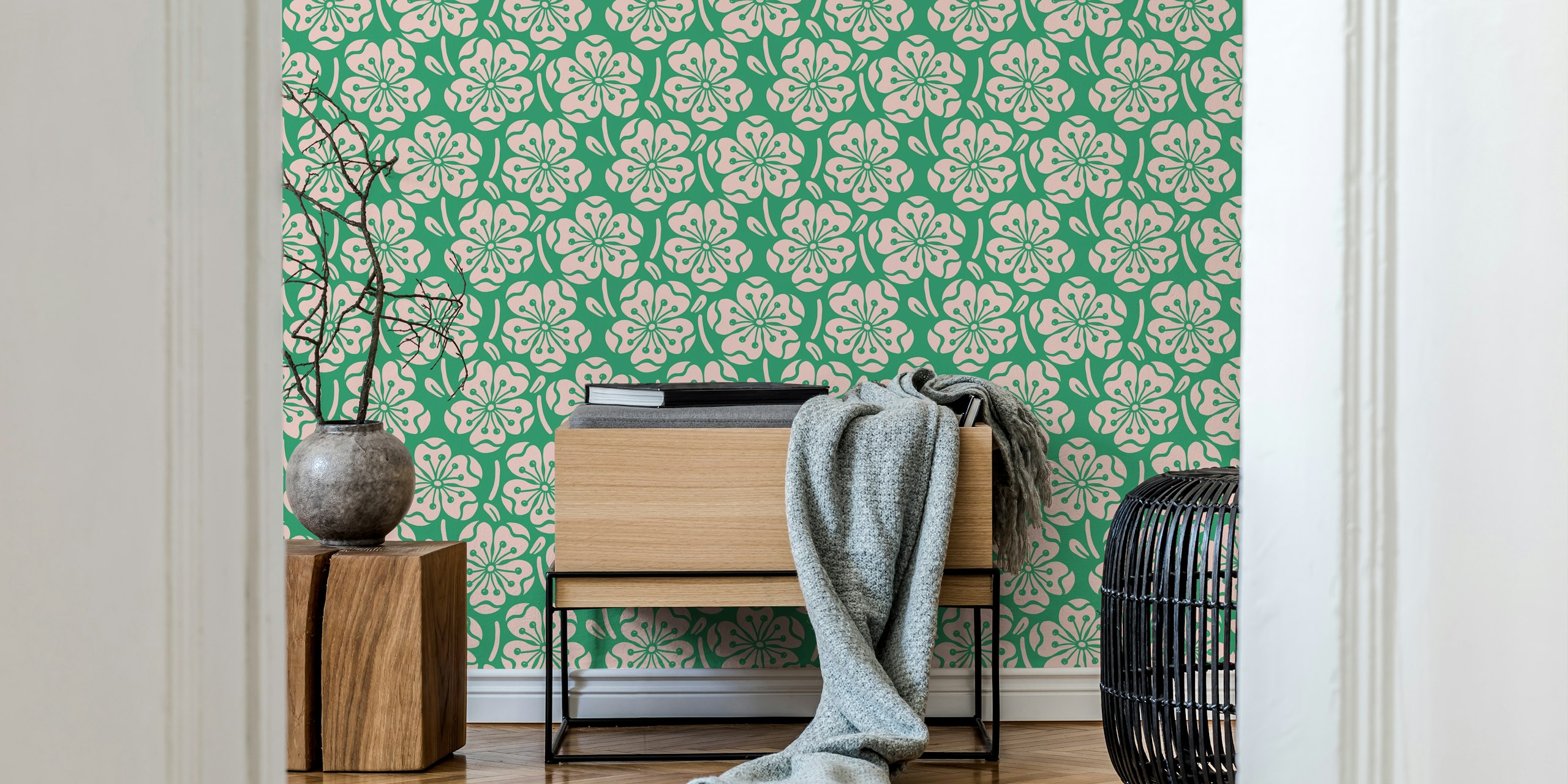 Pink floral patterns on green background wallpaper