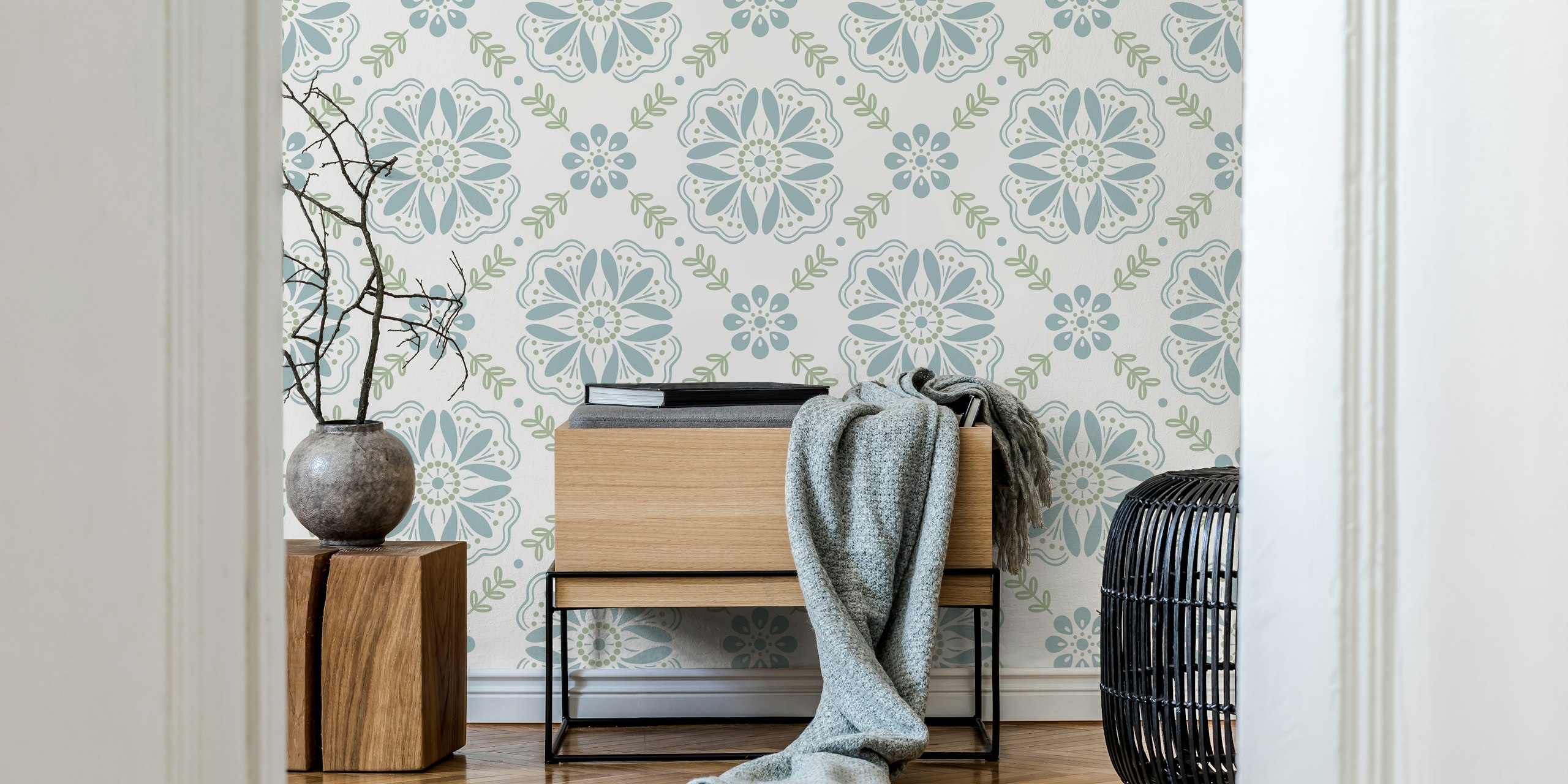 Floral pattern in sage green and blue on white wallpaper
