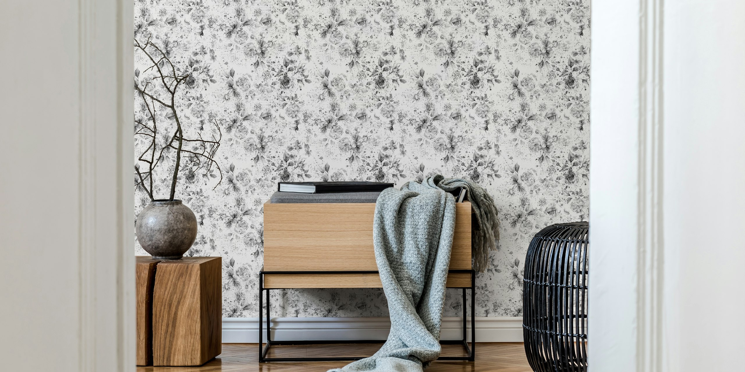 Textured black and white floral wallpaper with roses