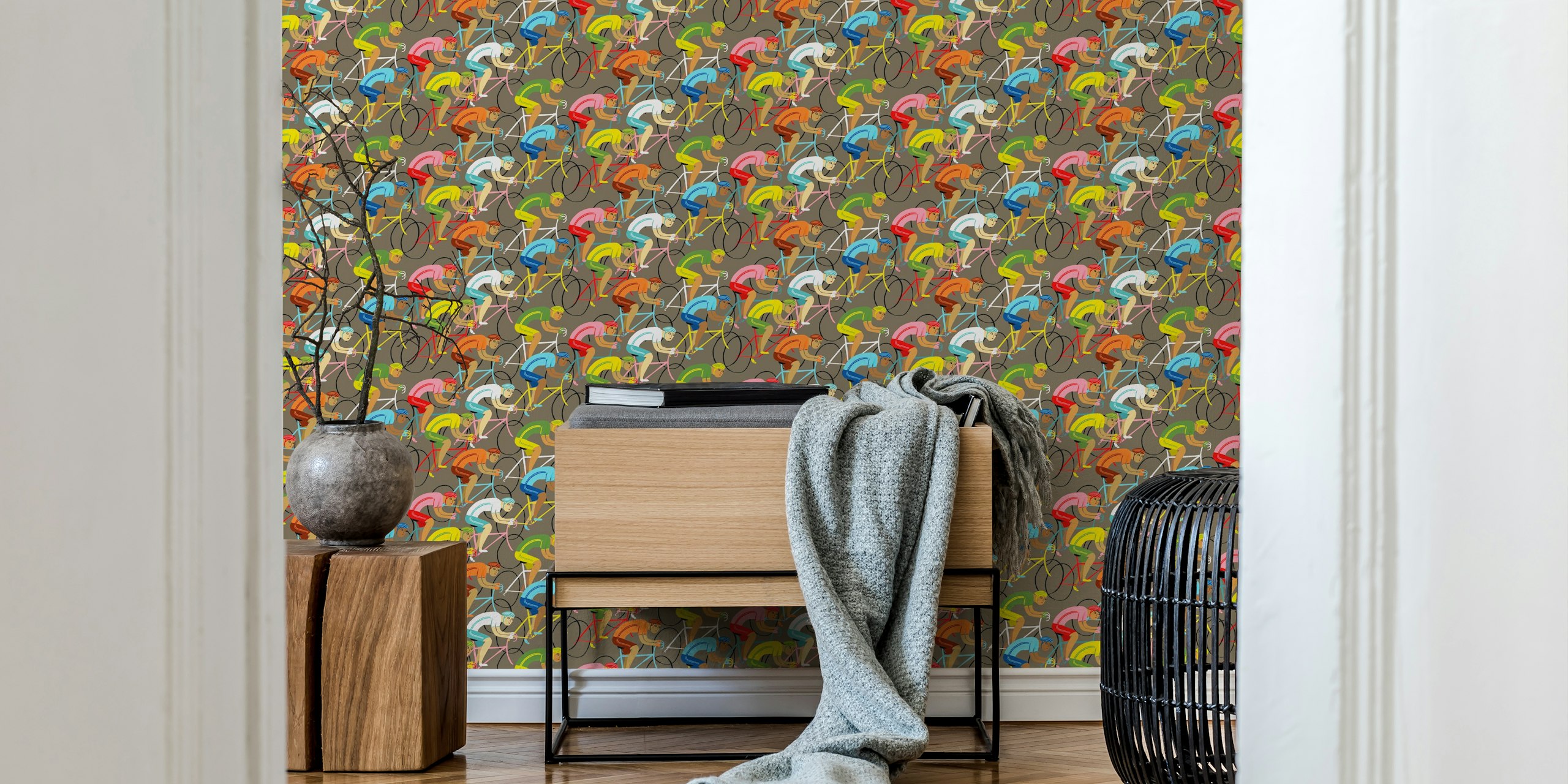 Colorful cyclists on bicycles in a racing pattern wallpaper