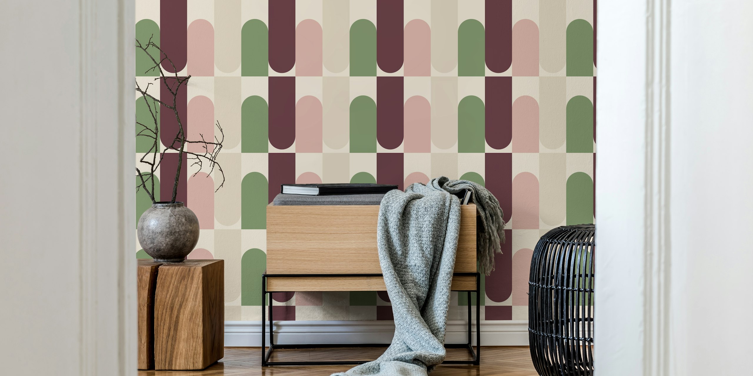 Geometric shapes in green, burgundy, and pink on beige wallpaper