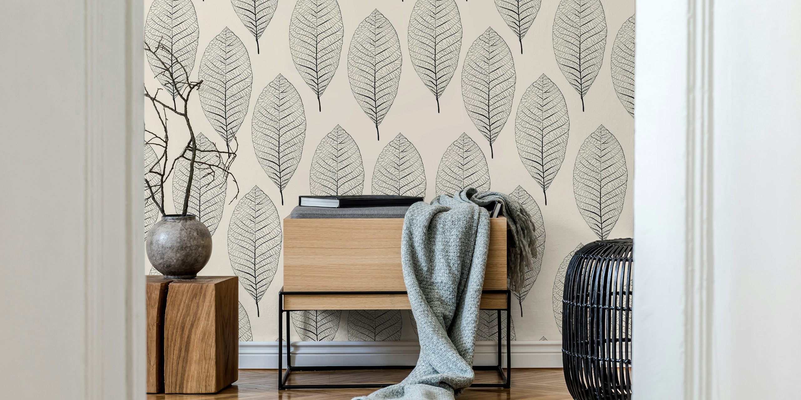 Black line-drawn leaves on cream background wallpaper