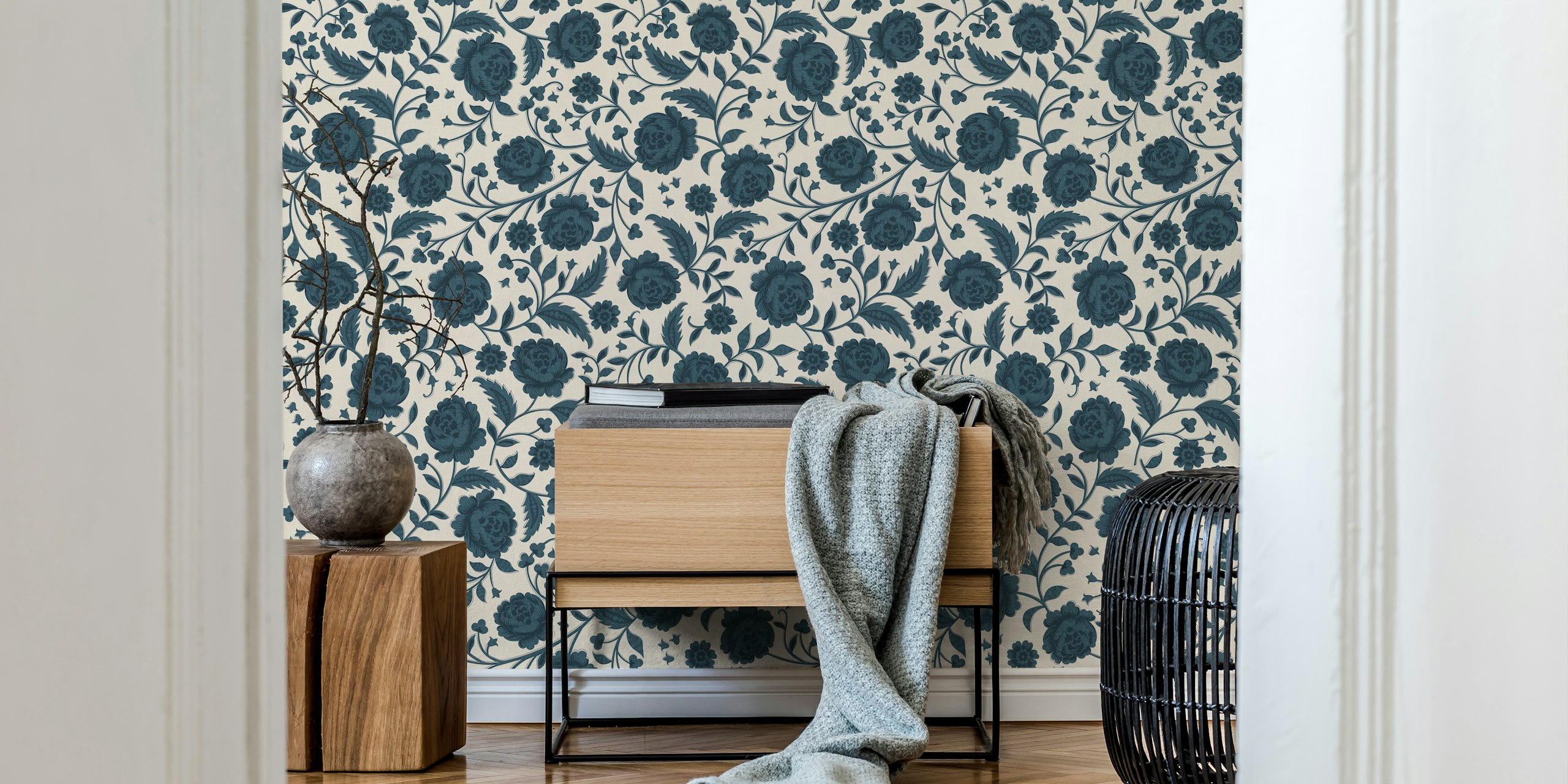 Ornate chintz floral pattern in navy on cream wallpaper