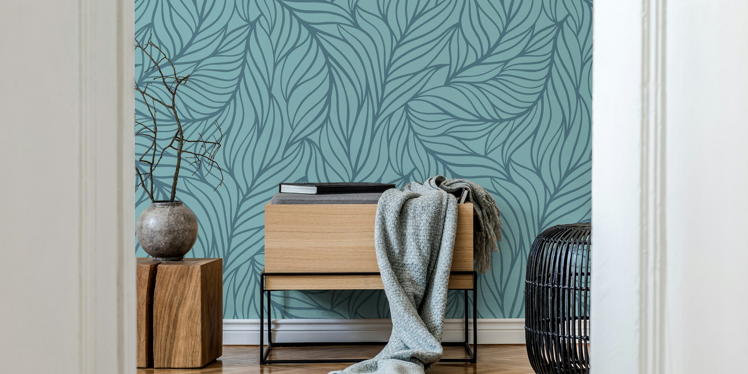 Flowing leaf pattern in blue on wallpaper