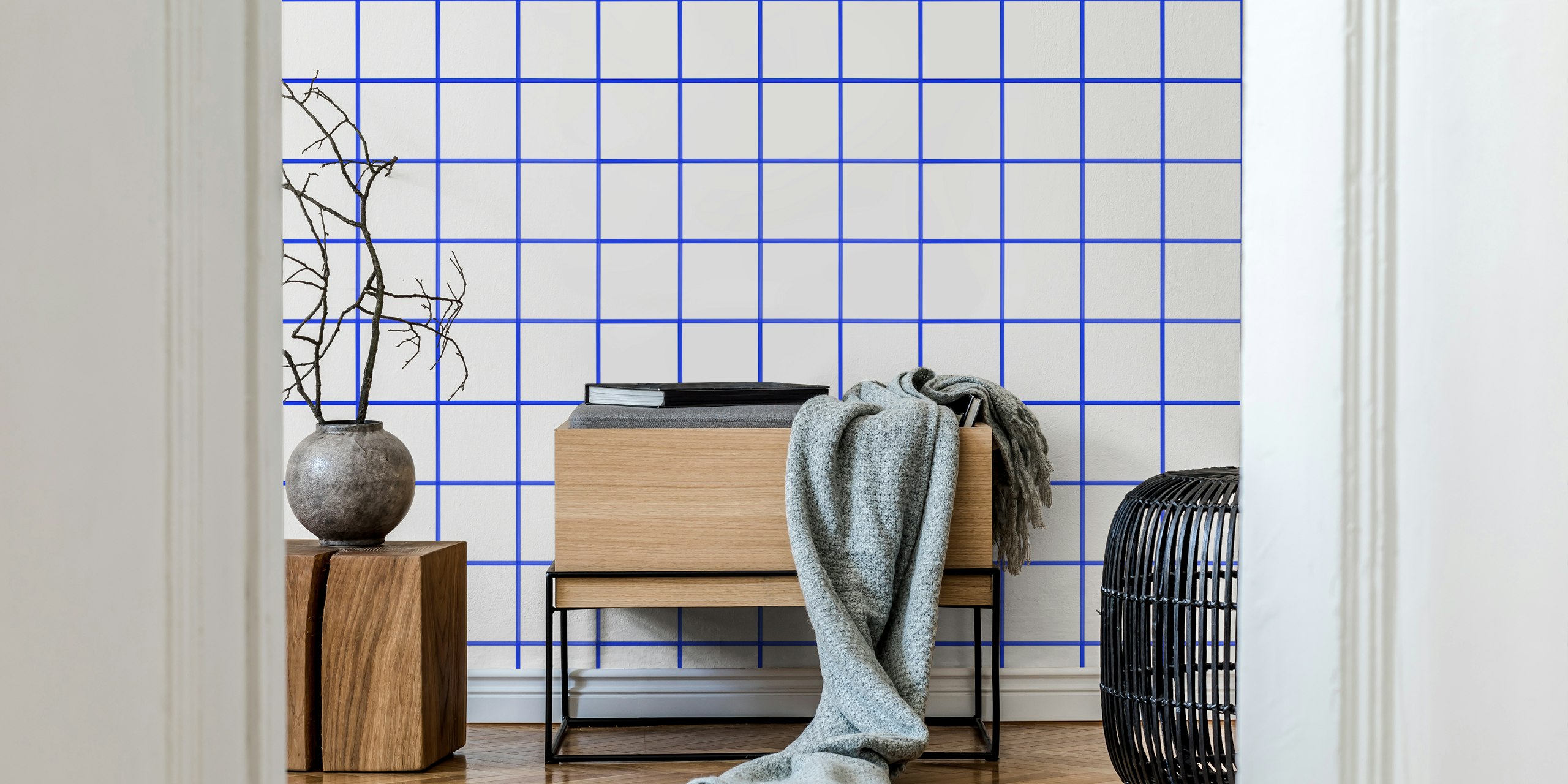 Fresh blue grouted white tiles wallpaper in a room