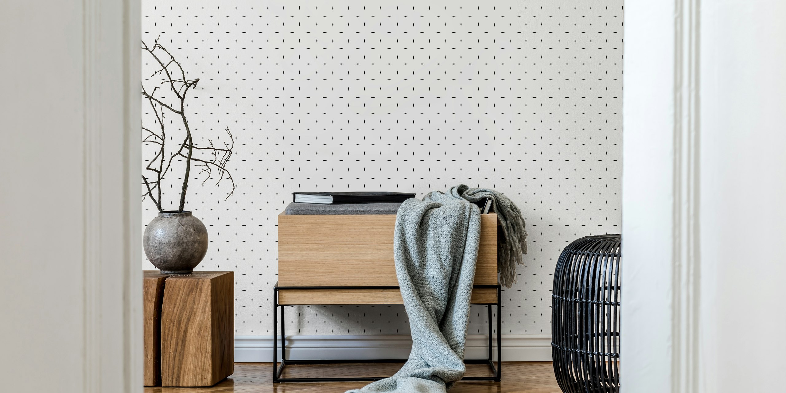 Monochrome diamond patterned wallpaper in a room
