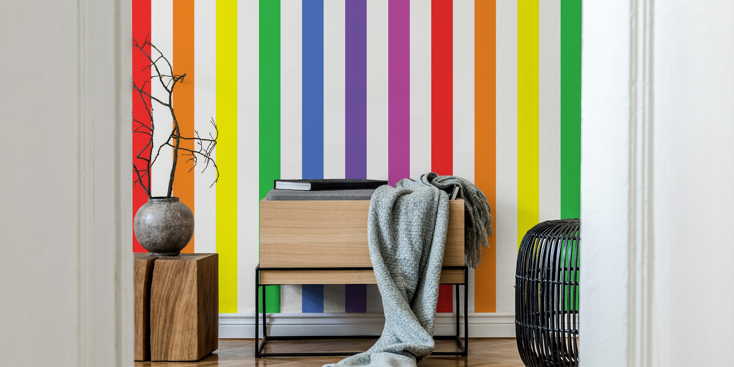 Colorful vertical stripes in red, orange, yellow, green, blue, and purple wallpaper