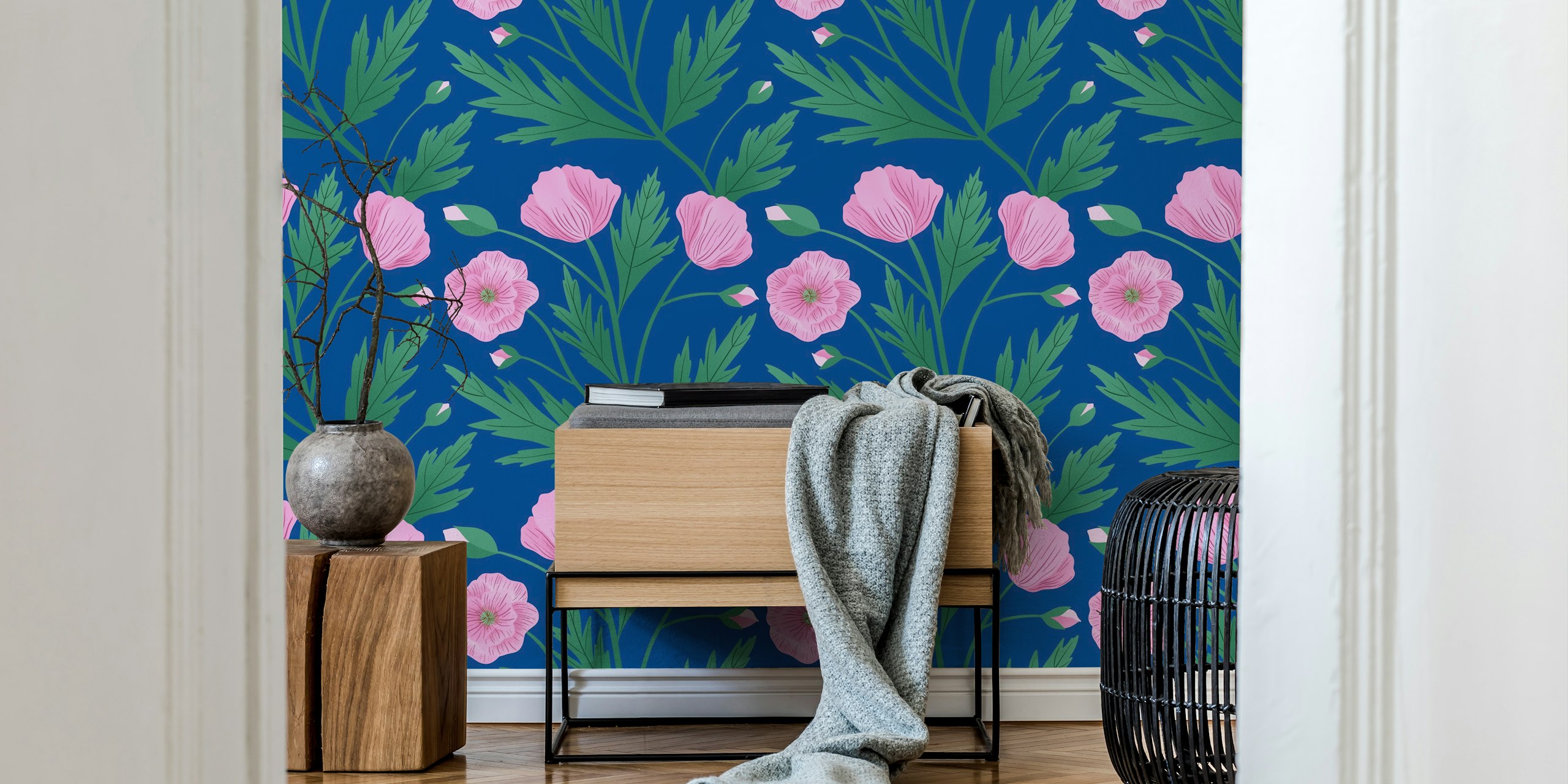 Pink poppies with green leaves on a blue background wall mural