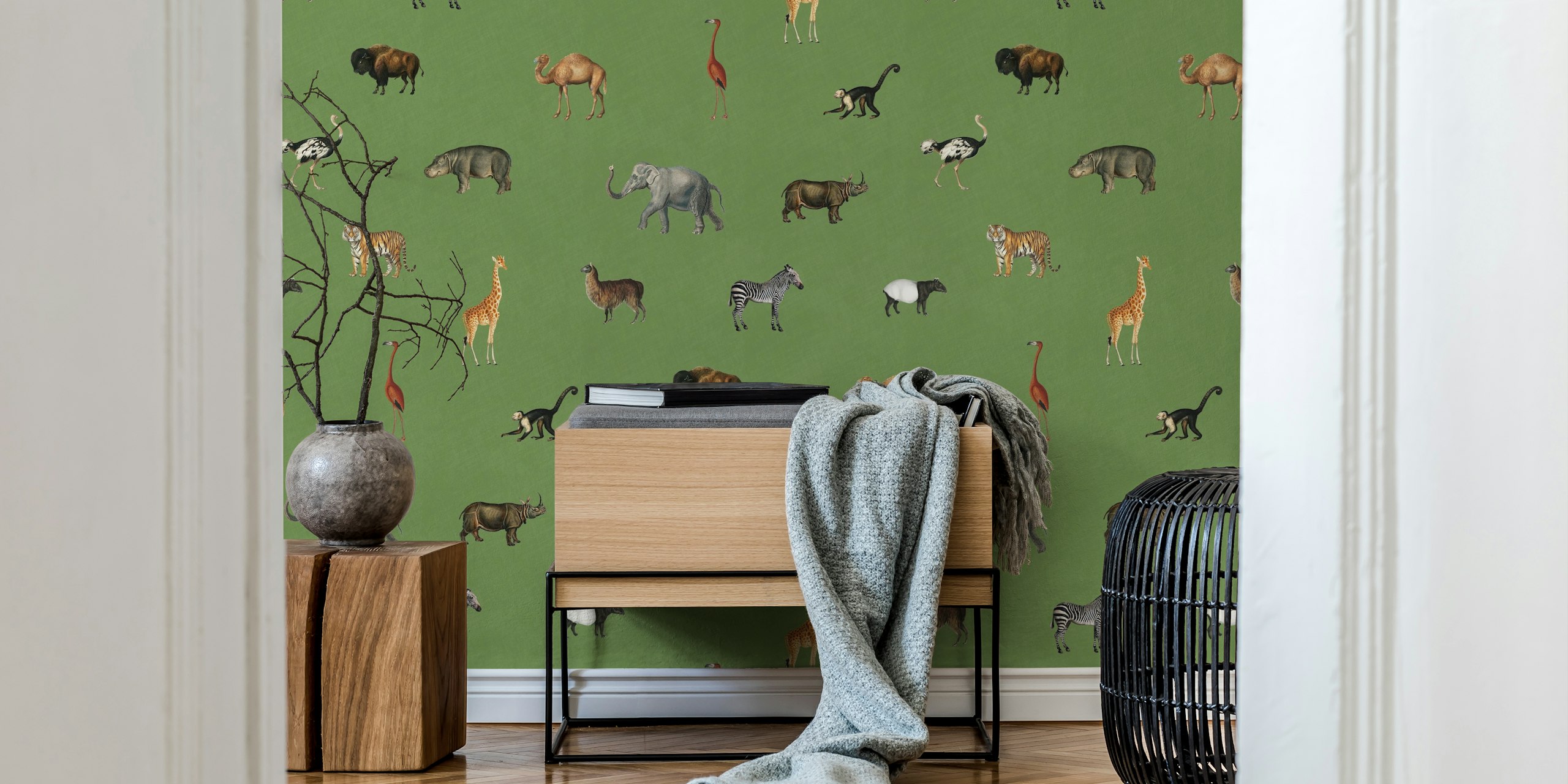 Green wallpaper with various animal illustrations including elephants, giraffes, and zebras