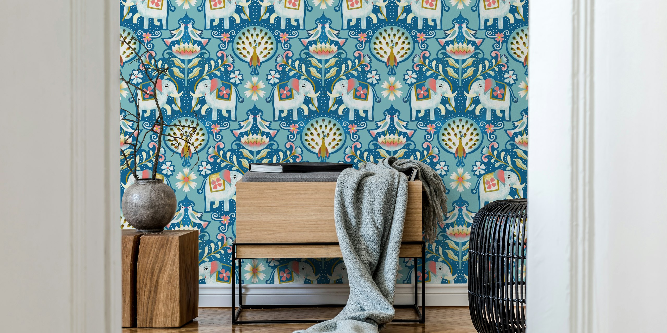 Elephant and peacock wallpaper in a room