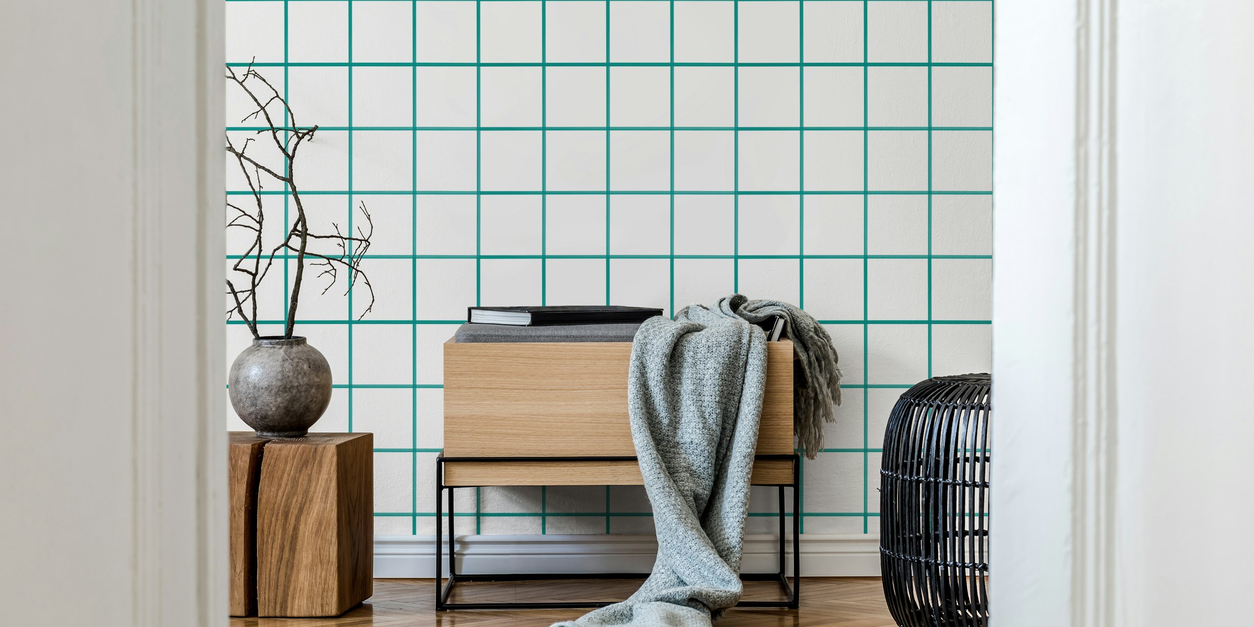 Papier peint mural en carrelage vert avec des teintes subtiles et des lignes épurées pour des murs contemporains.