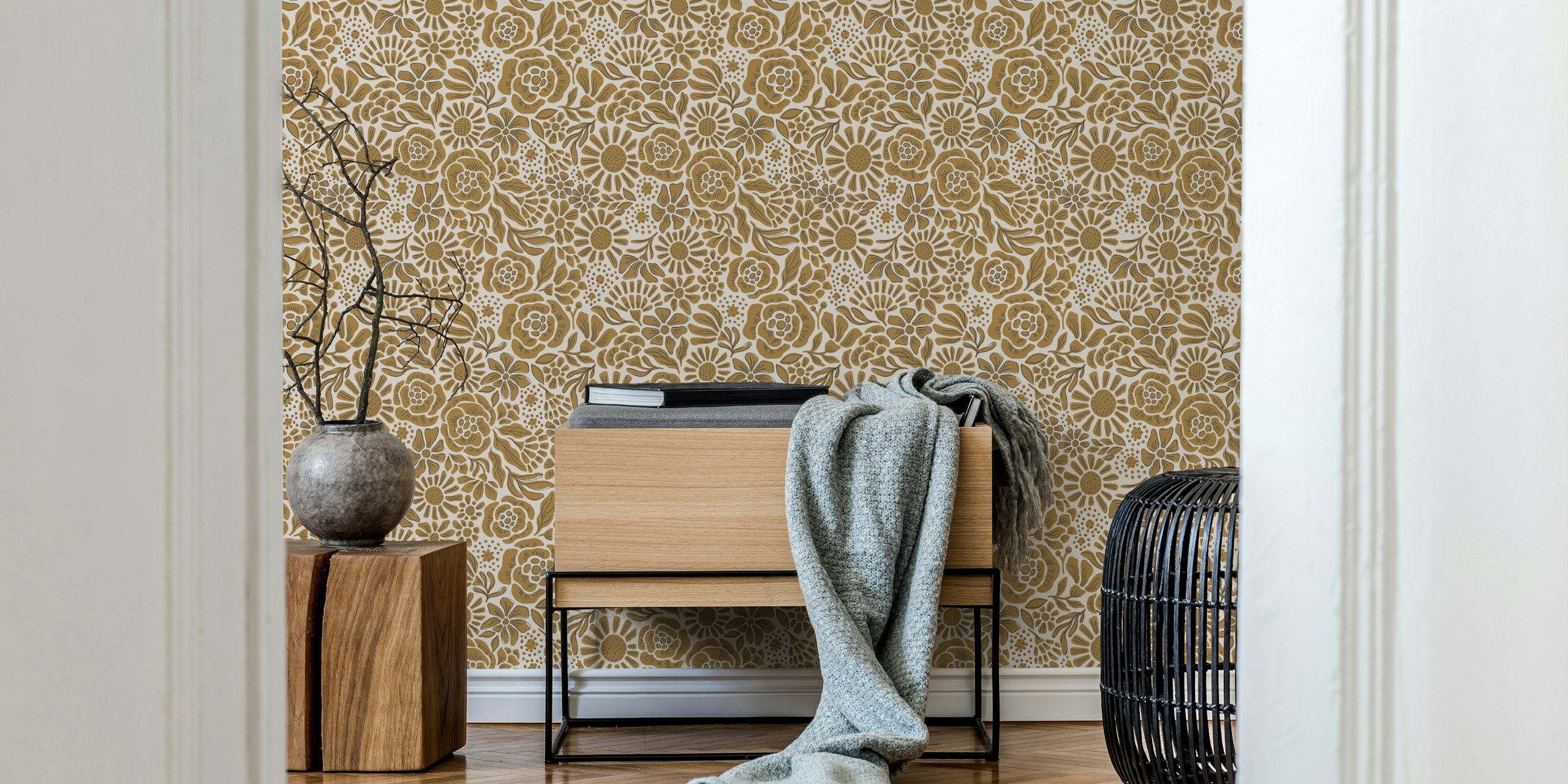 Gold floral pattern wallpaper with various flowers and leaves on a light background