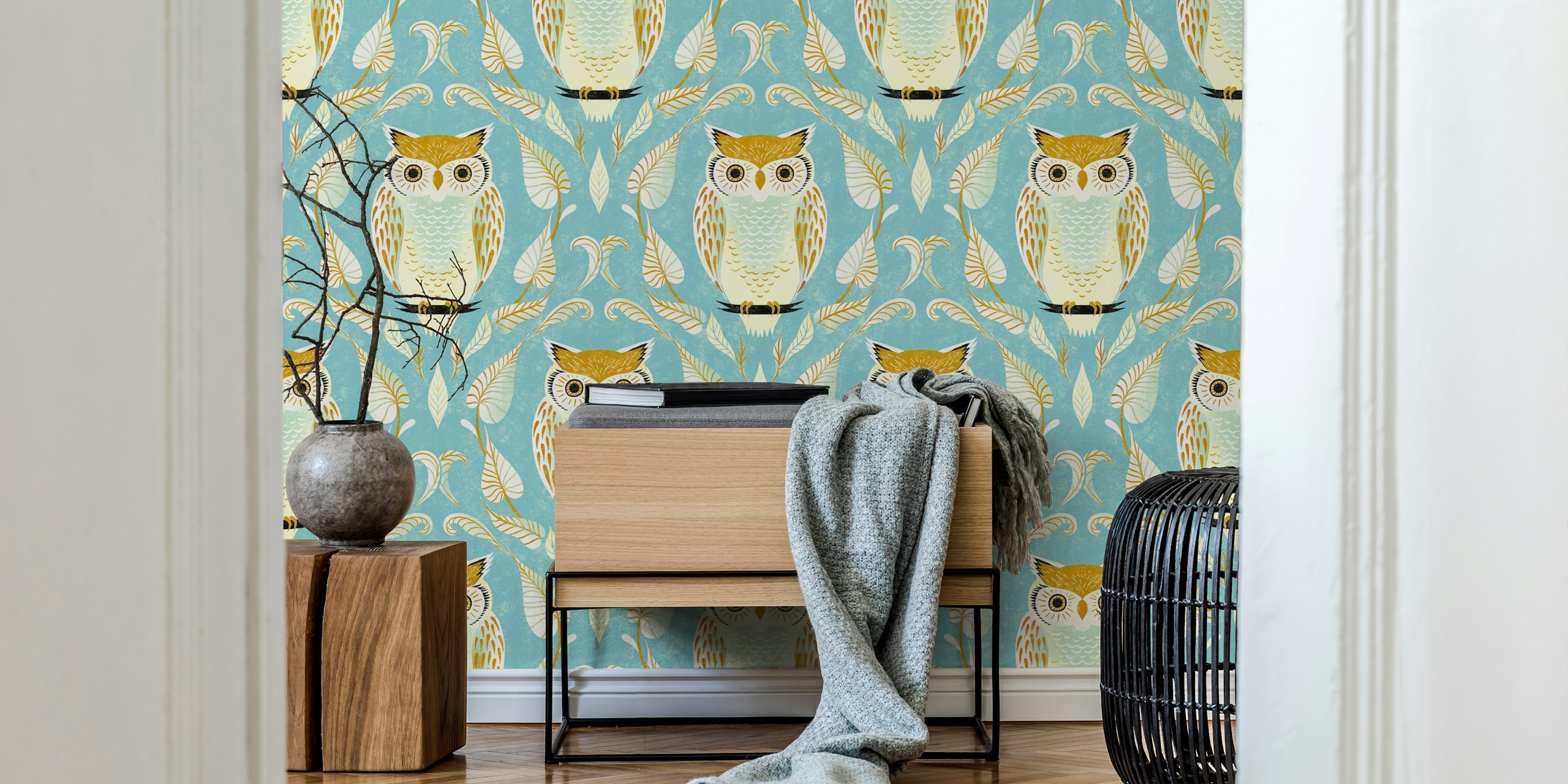 Colorful snow owl and leaf pattern on aqua blue wallpaper