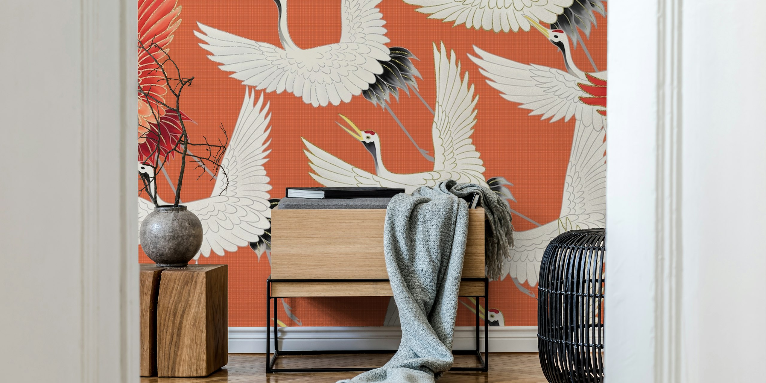 Flying cranes in white and red on orange background wallpaper