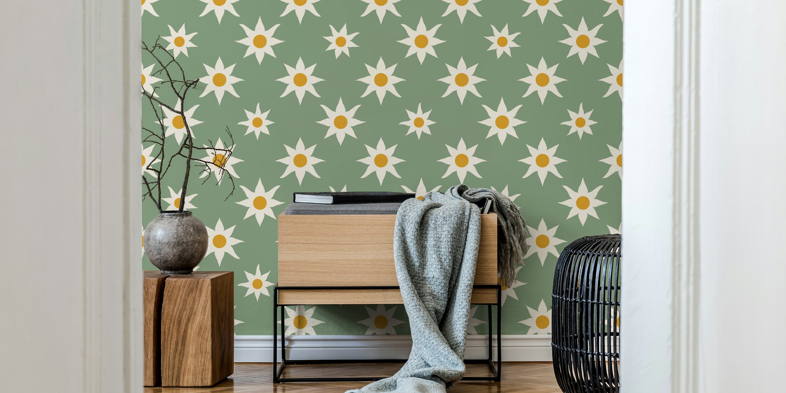 Sage green wallpaper with sunburst floral design in beige and yellow.
