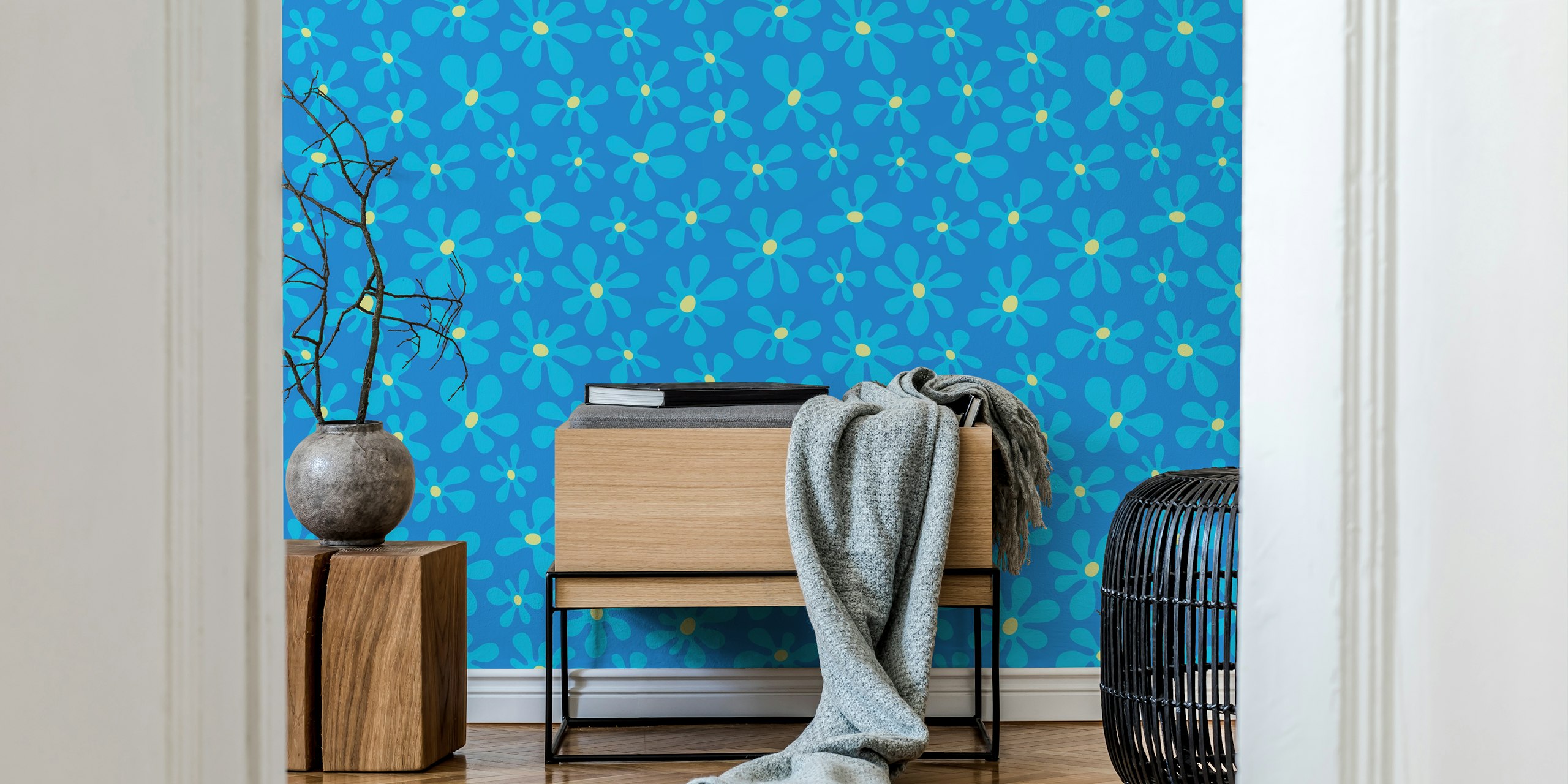 Bright blue background with playful floral designs in yellow and turquoise wallpaper