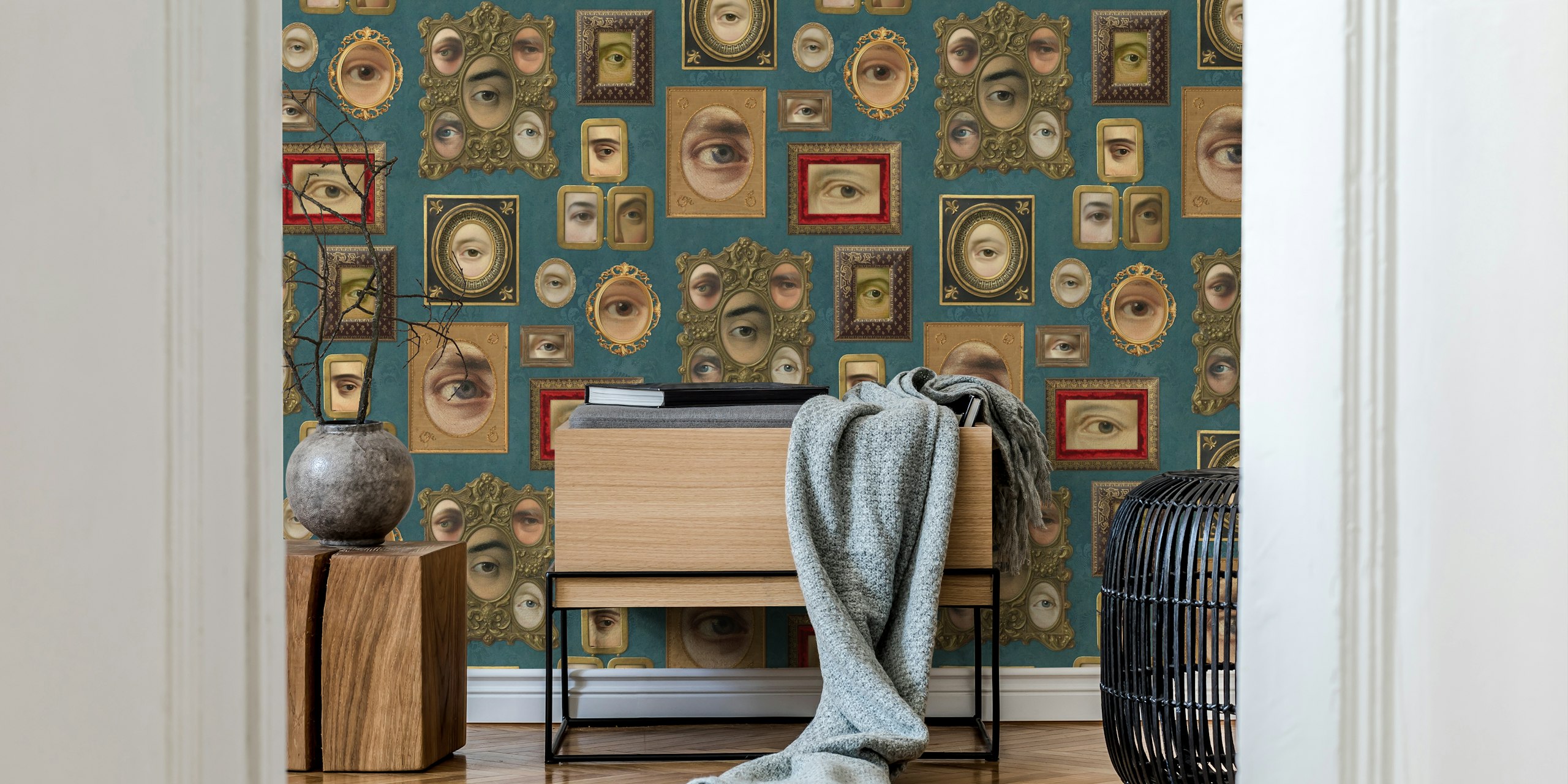 Teal blue wallpaper with Victorian portrait eyes