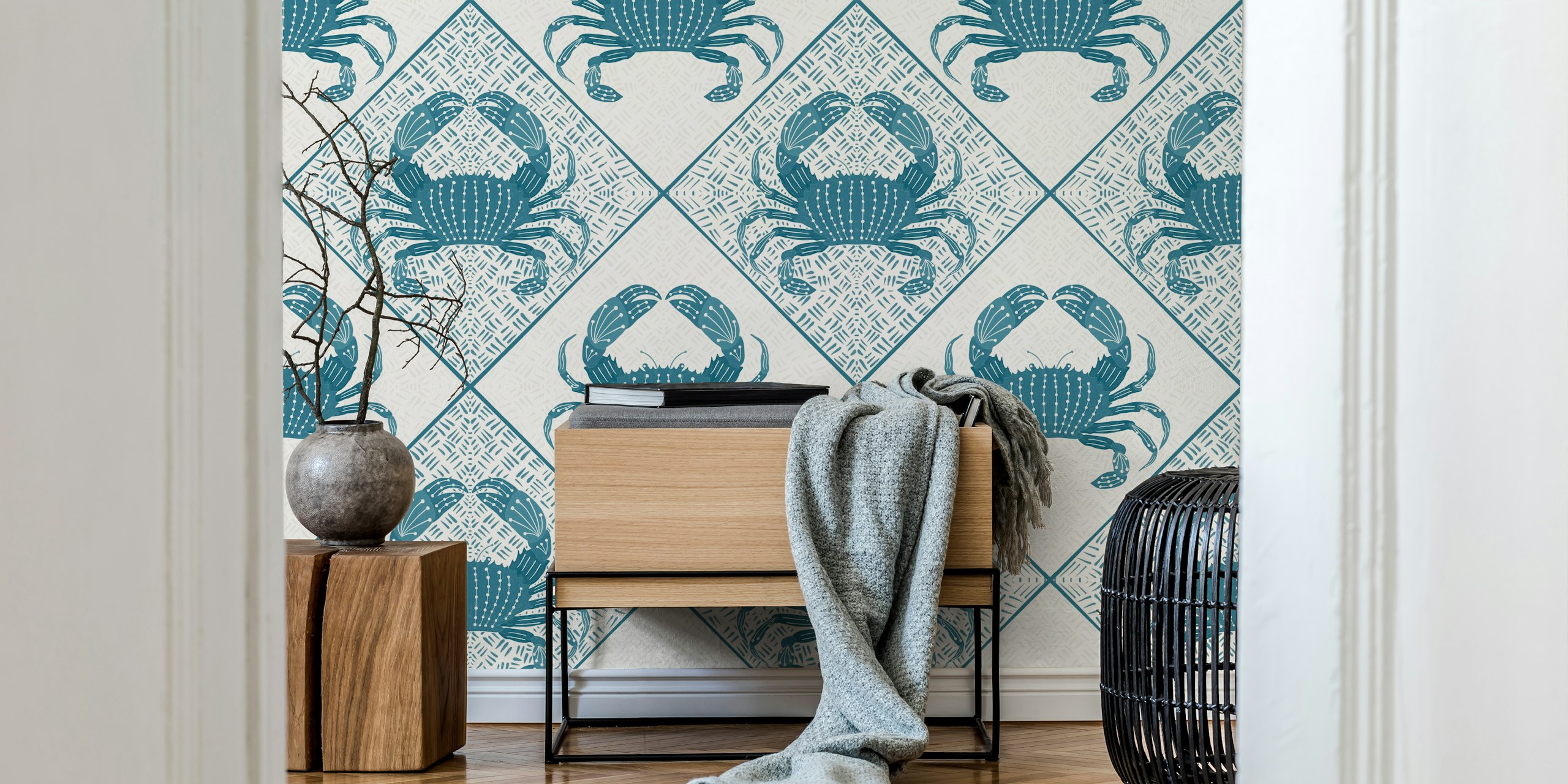 Stylized blue crabs in a symmetrical pattern on a wall mural.