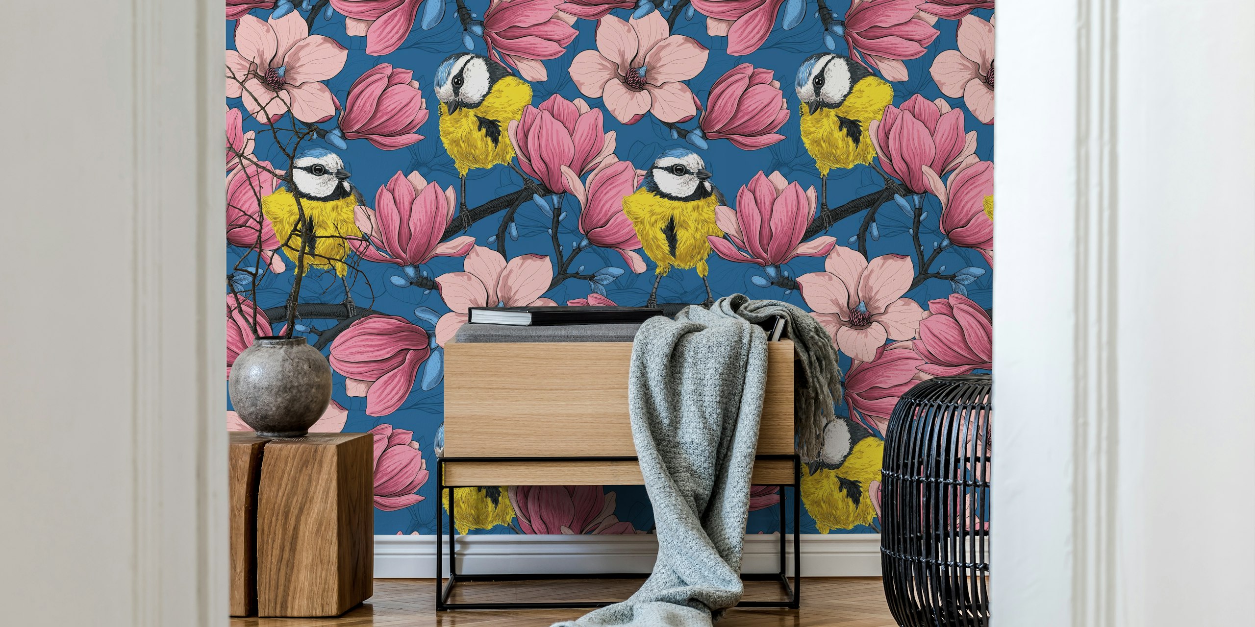 Two birds perched on pink flowers with blue background wallpaper