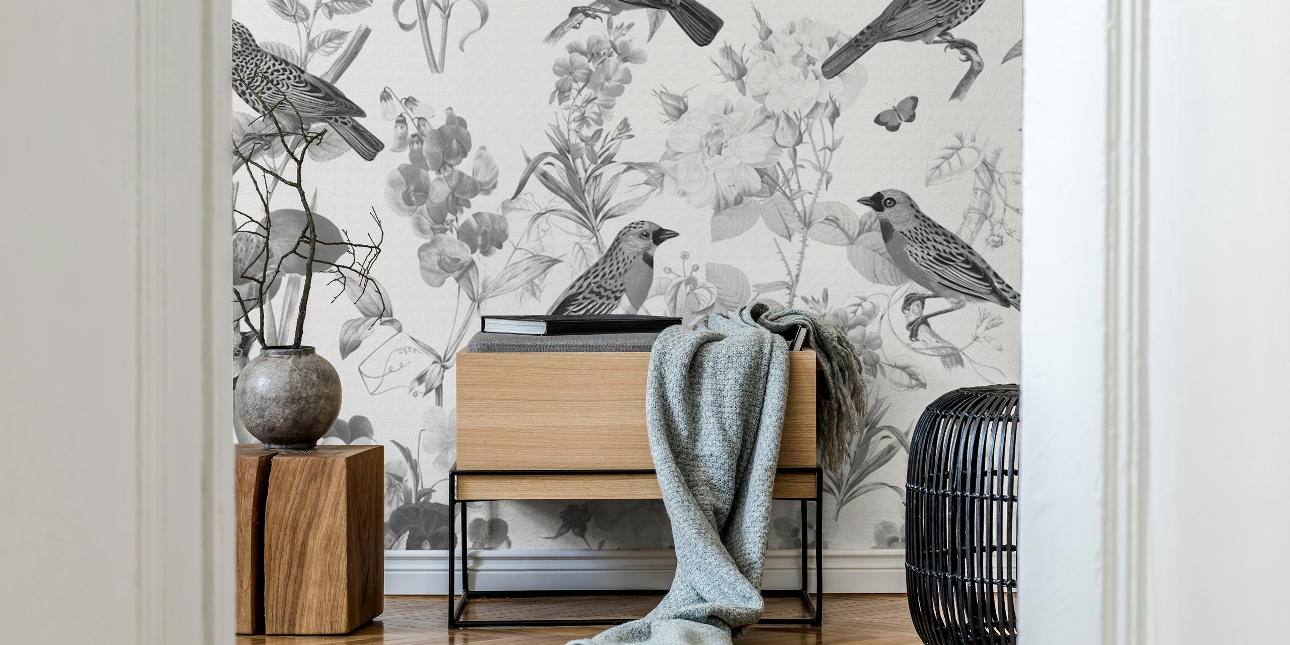 Black floral wallpaper featuring birds and flowers in monochrome style