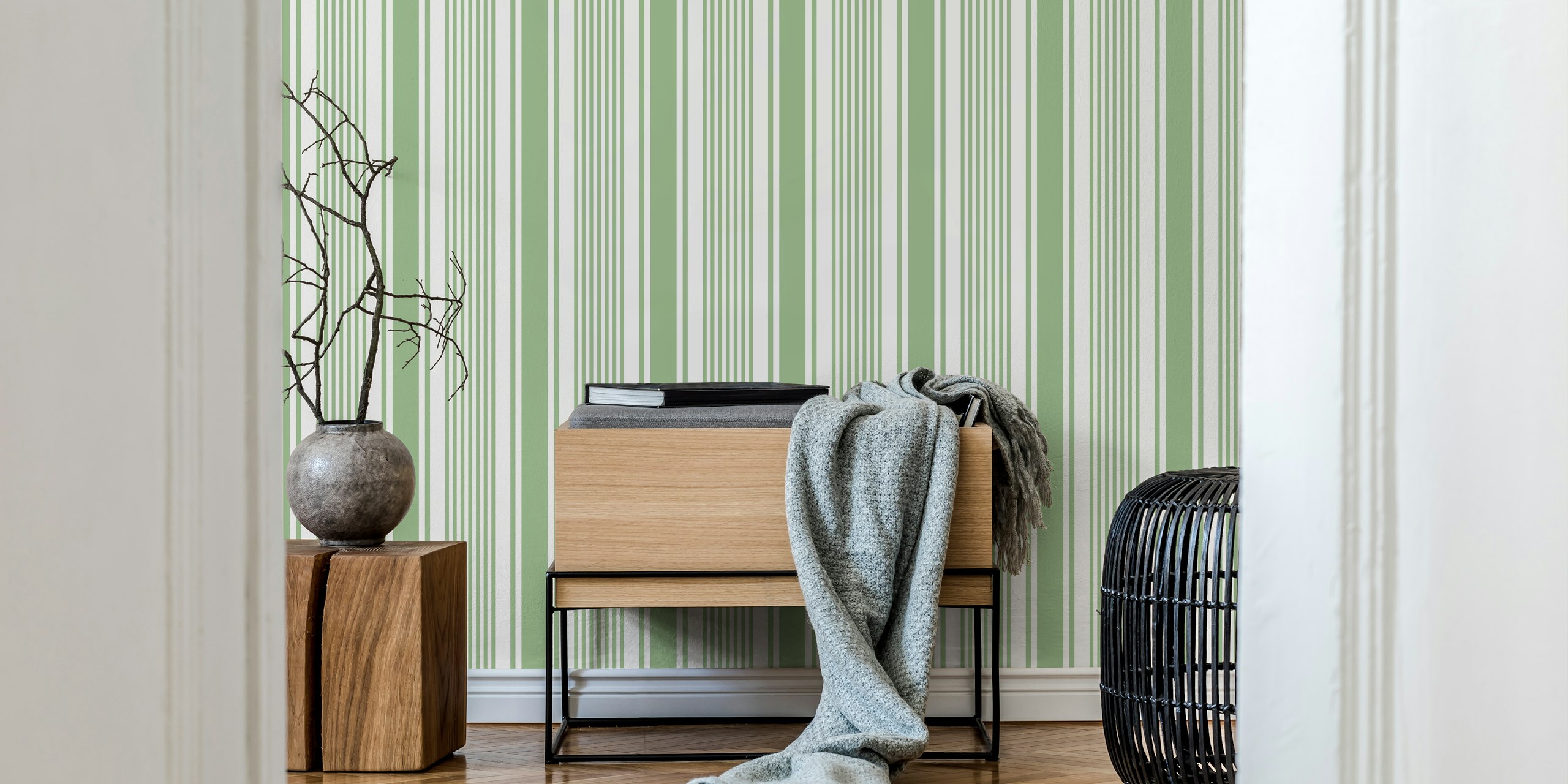 Sage green and white striped wallpaper in a modern pattern