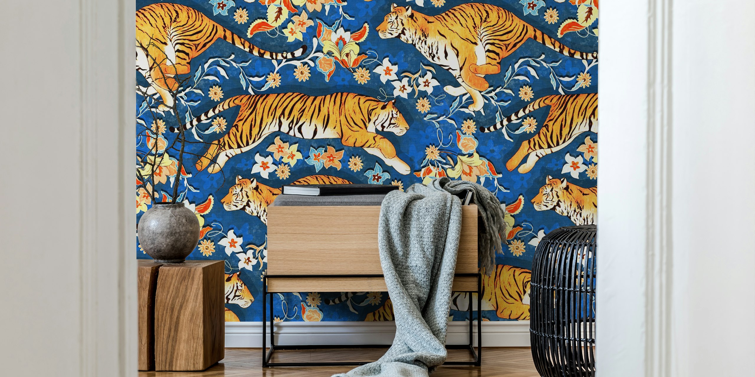 Tigers among floral patterns on blue background wallpaper