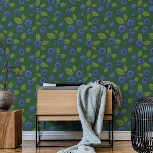 Blueberries on dark green