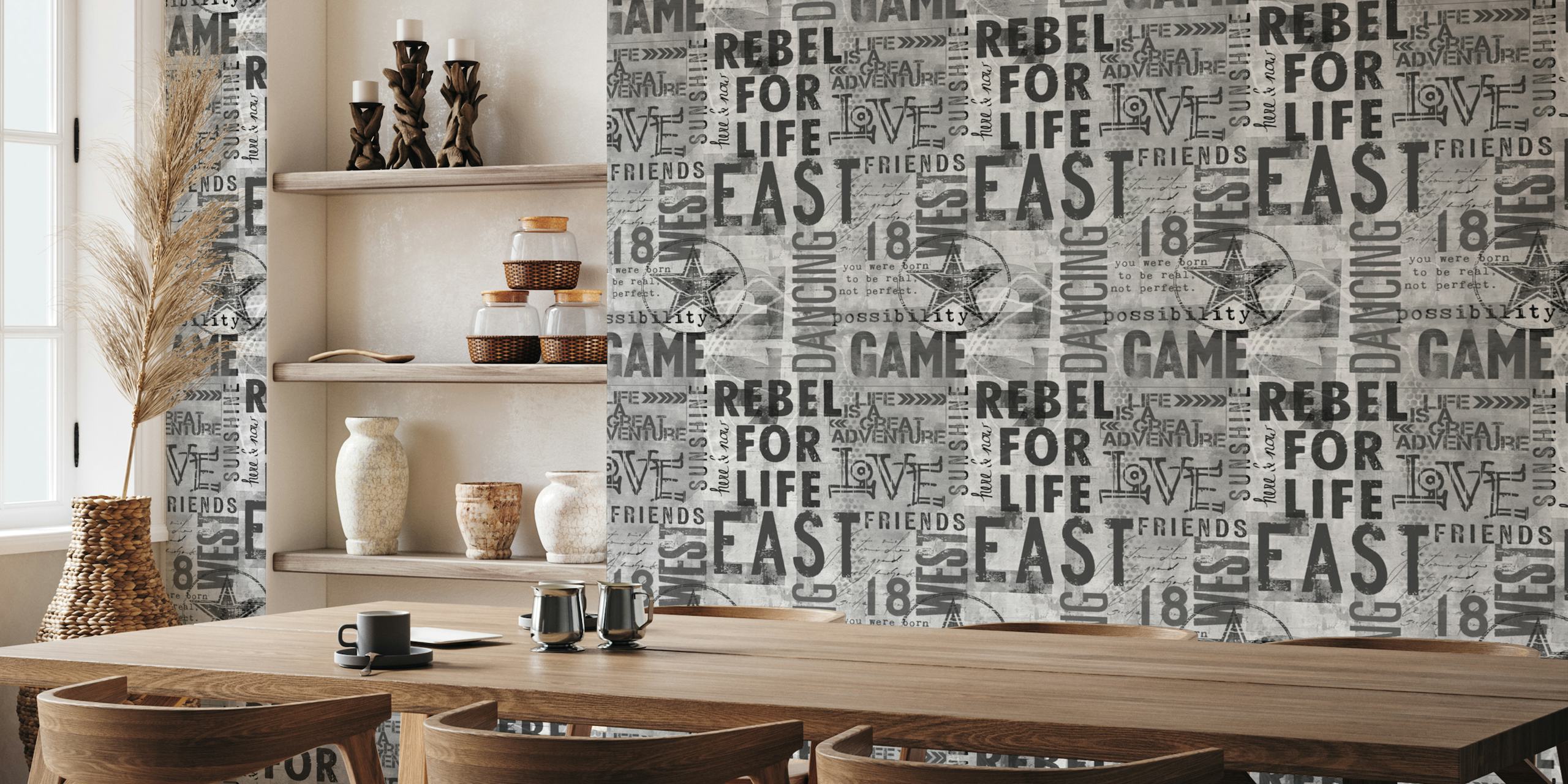 Murale artistico tipografico grunge monocromatico a tema urbano con parole come "REBEL", "GAME", "ADVENTURE" e "FRIENDS".