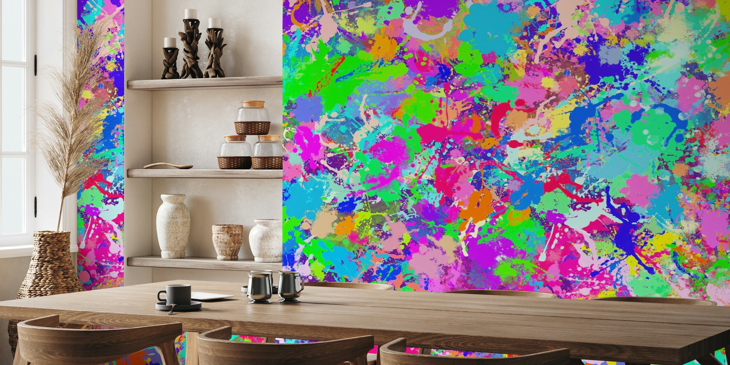 Kleurrijke abstracte verfspatten muurschildering met levendige tinten roze, blauw, groen en geel
