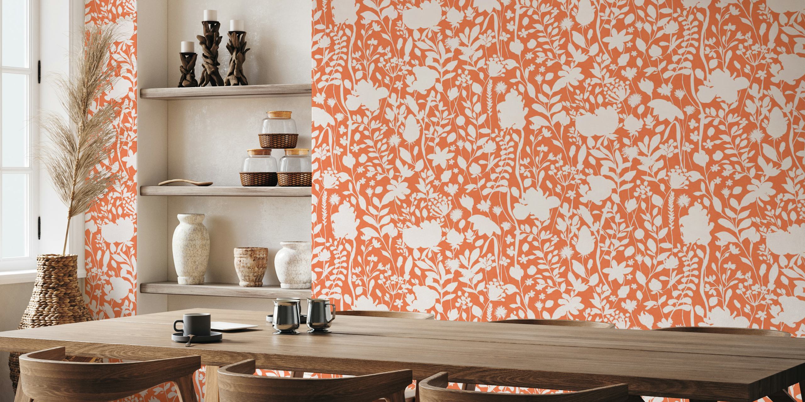 Floral silhouettes in white against an orange background wallpaper