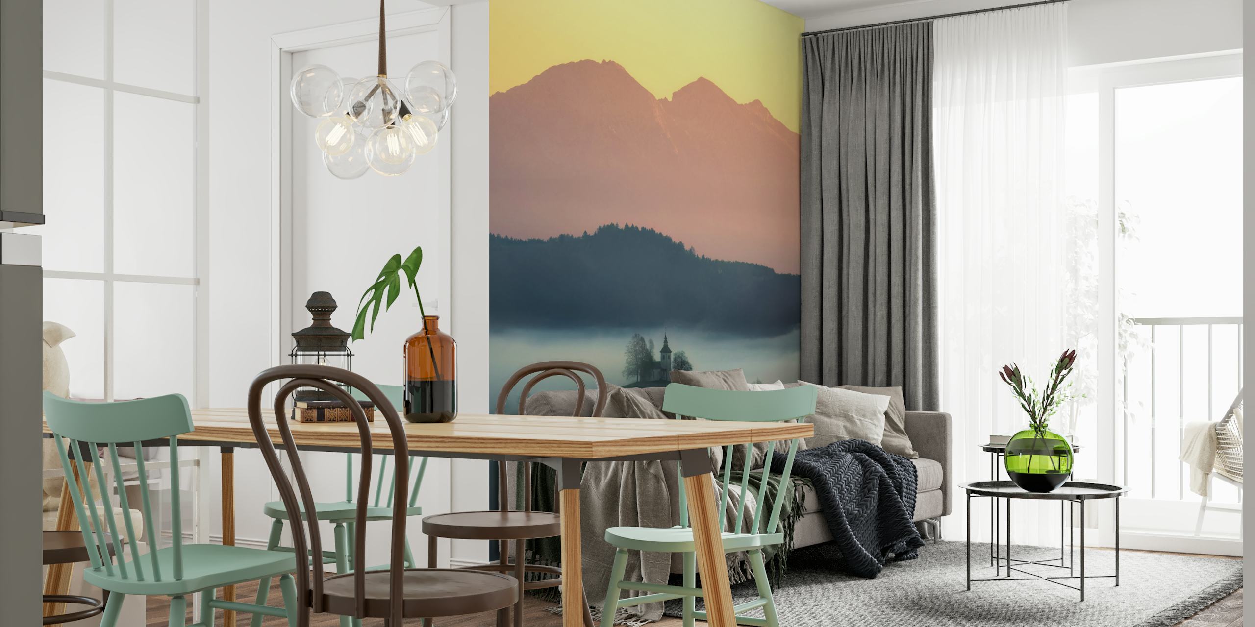 Hilltop church shrouded in mist with mountains in the background at sunrise wallpaper