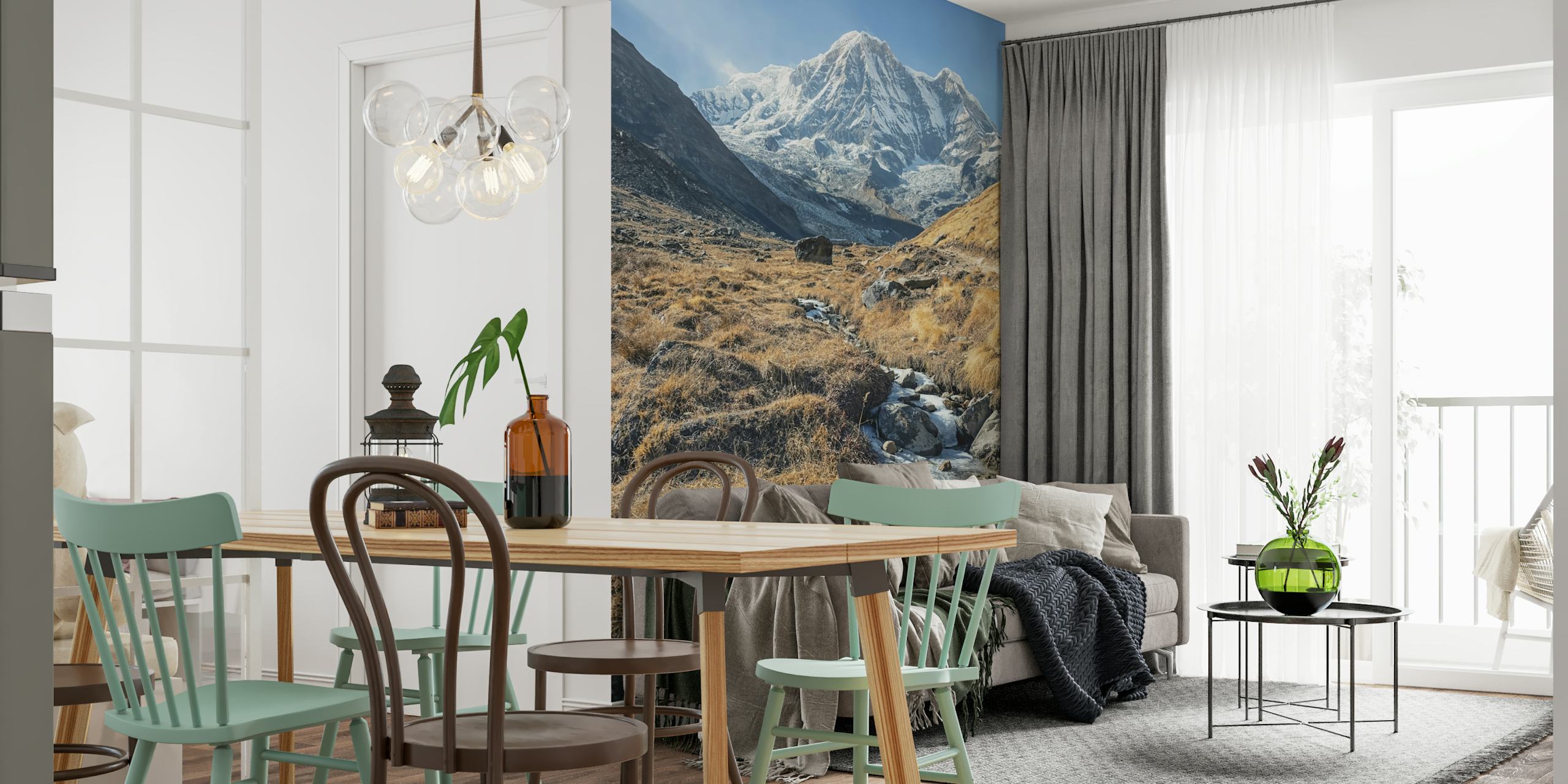 Mountain landscape with snow-capped peaks and grassy terrain wallpaper