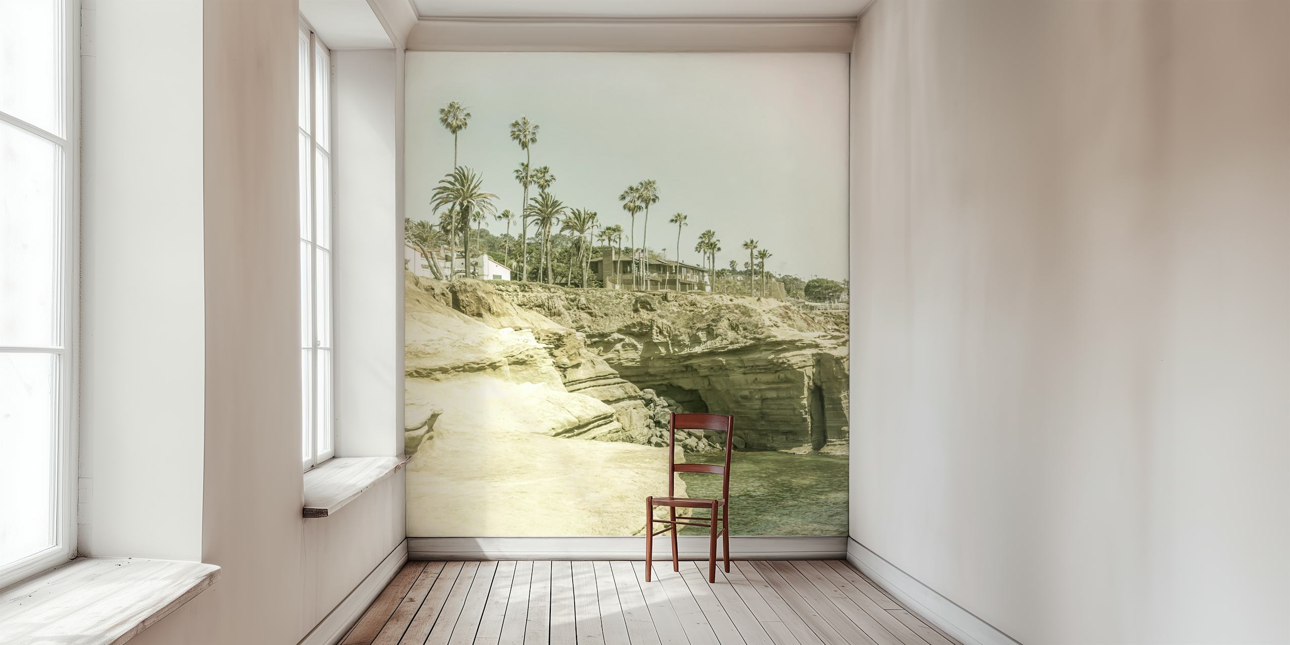 Palm trees and rocky cliffs by the ocean in muted colors wallpaper