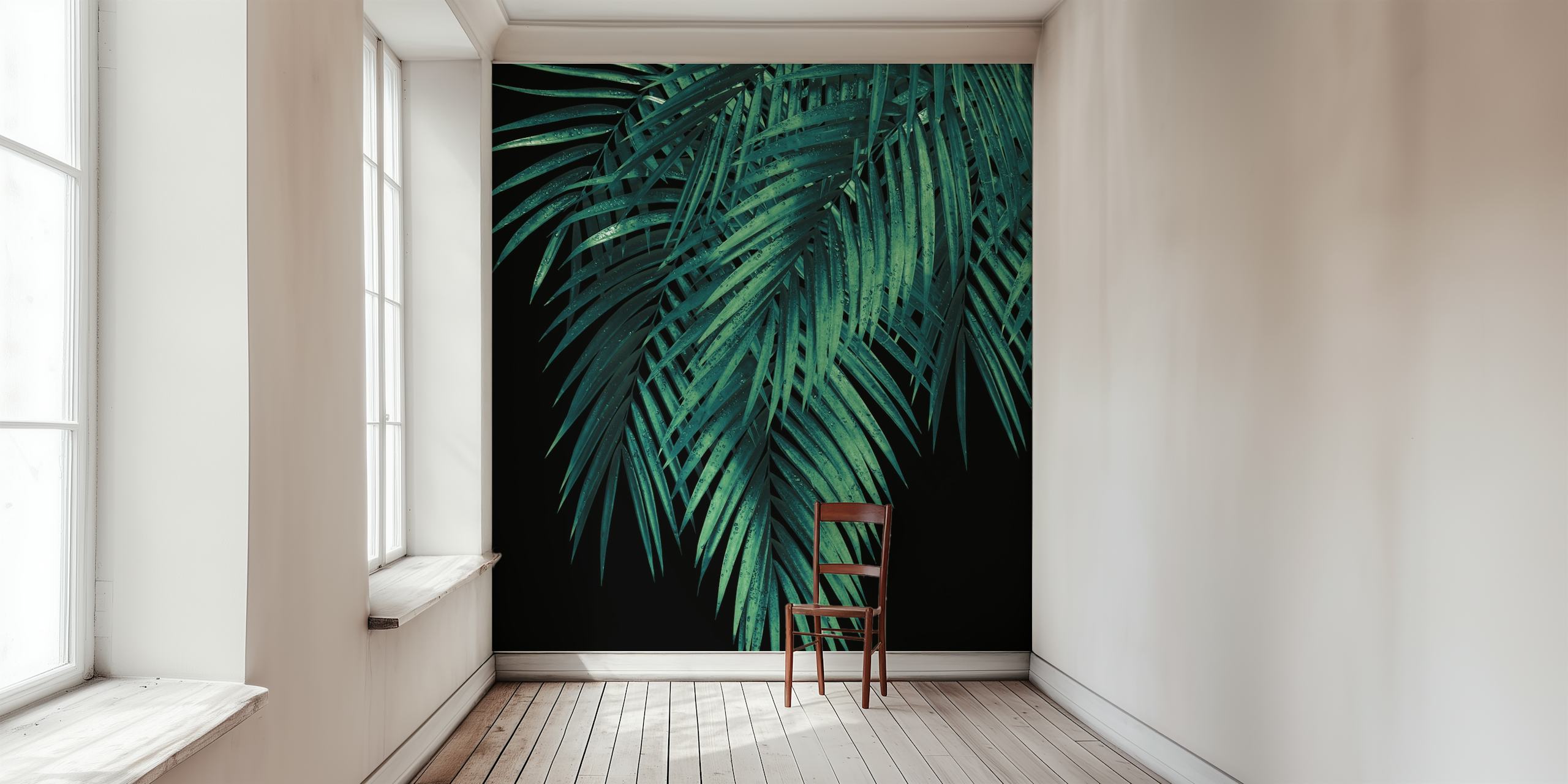 Verdant palm leaves against a dark night backdrop wall mural